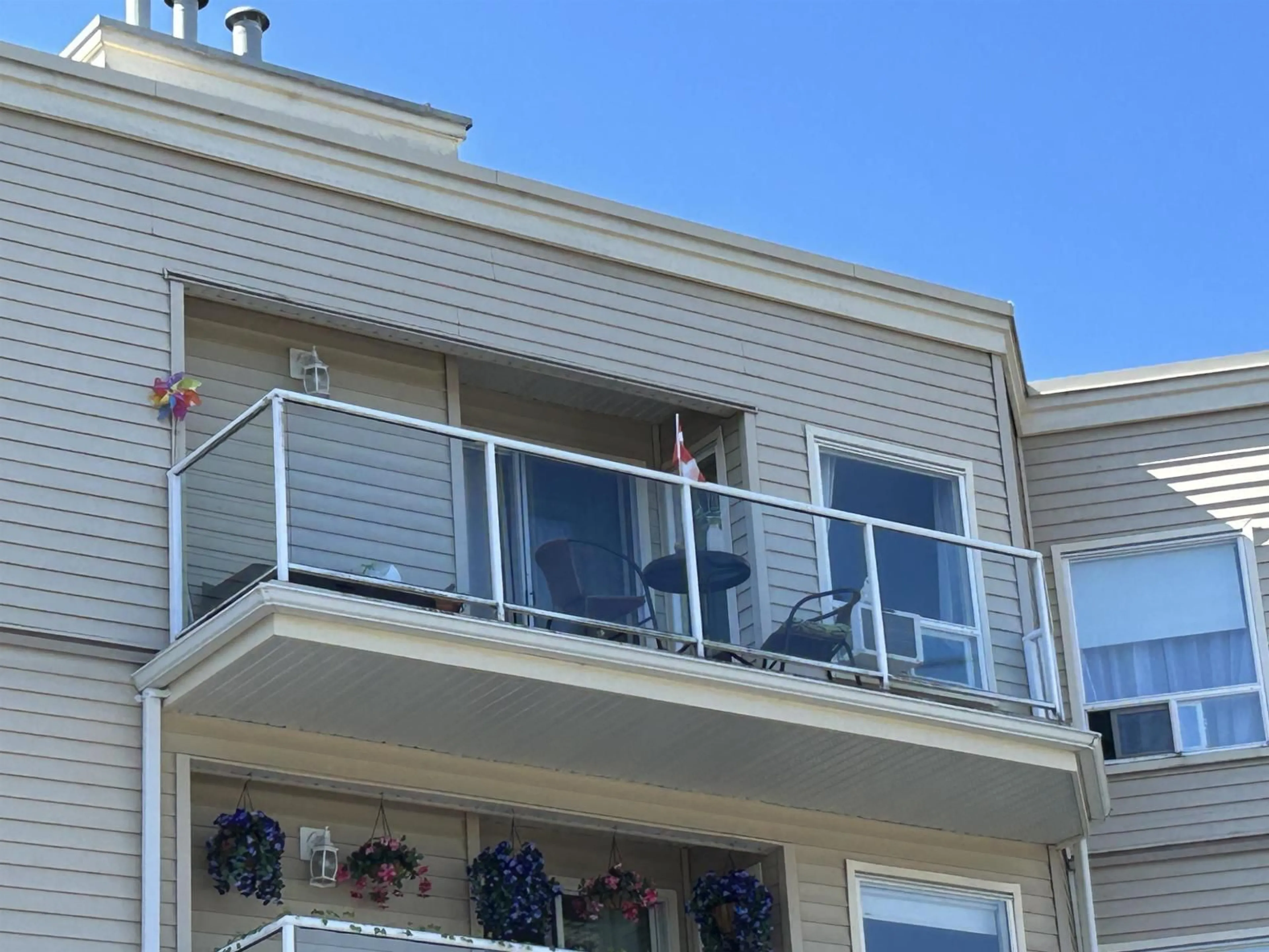 Balcony in the apartment, city buildings view from balcony for 305 - 9295 122 STREET, Surrey British Columbia V3V4L4