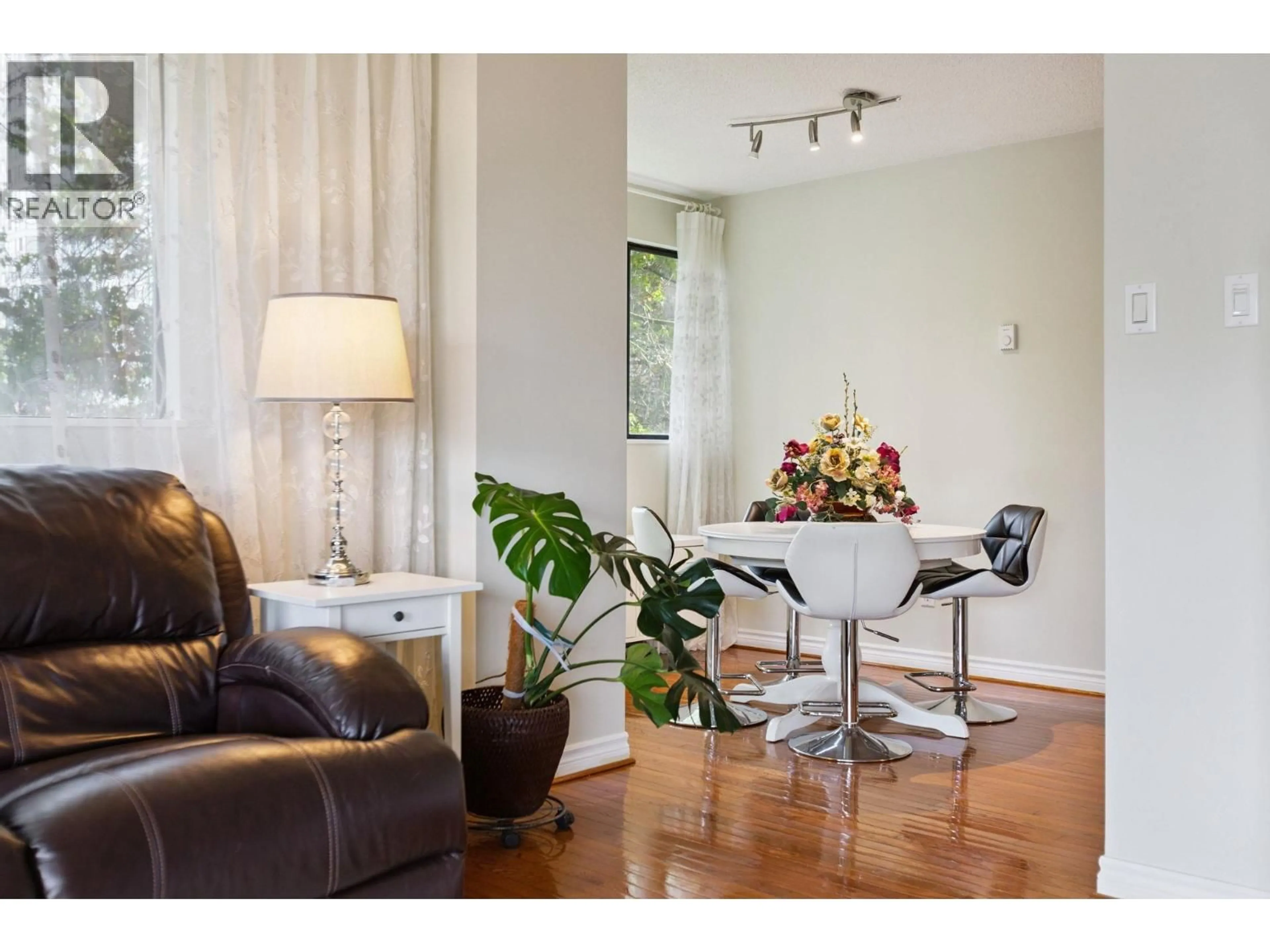 Living room with furniture, wood/laminate floor for 402 - 1026 QUEENS AVENUE, New Westminster British Columbia V3M6B2