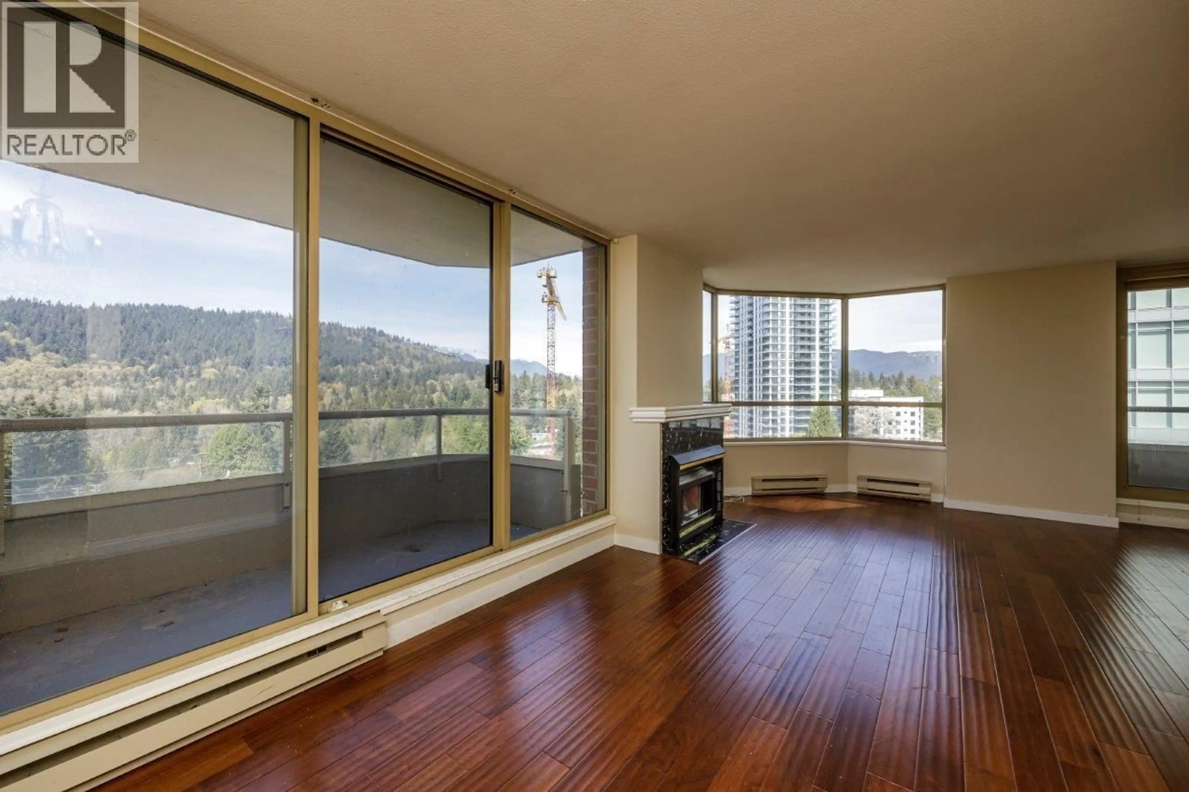 Living room with furniture, wood/laminate floor for 903 - 738 FARROW STREET, Coquitlam British Columbia V3J7V4