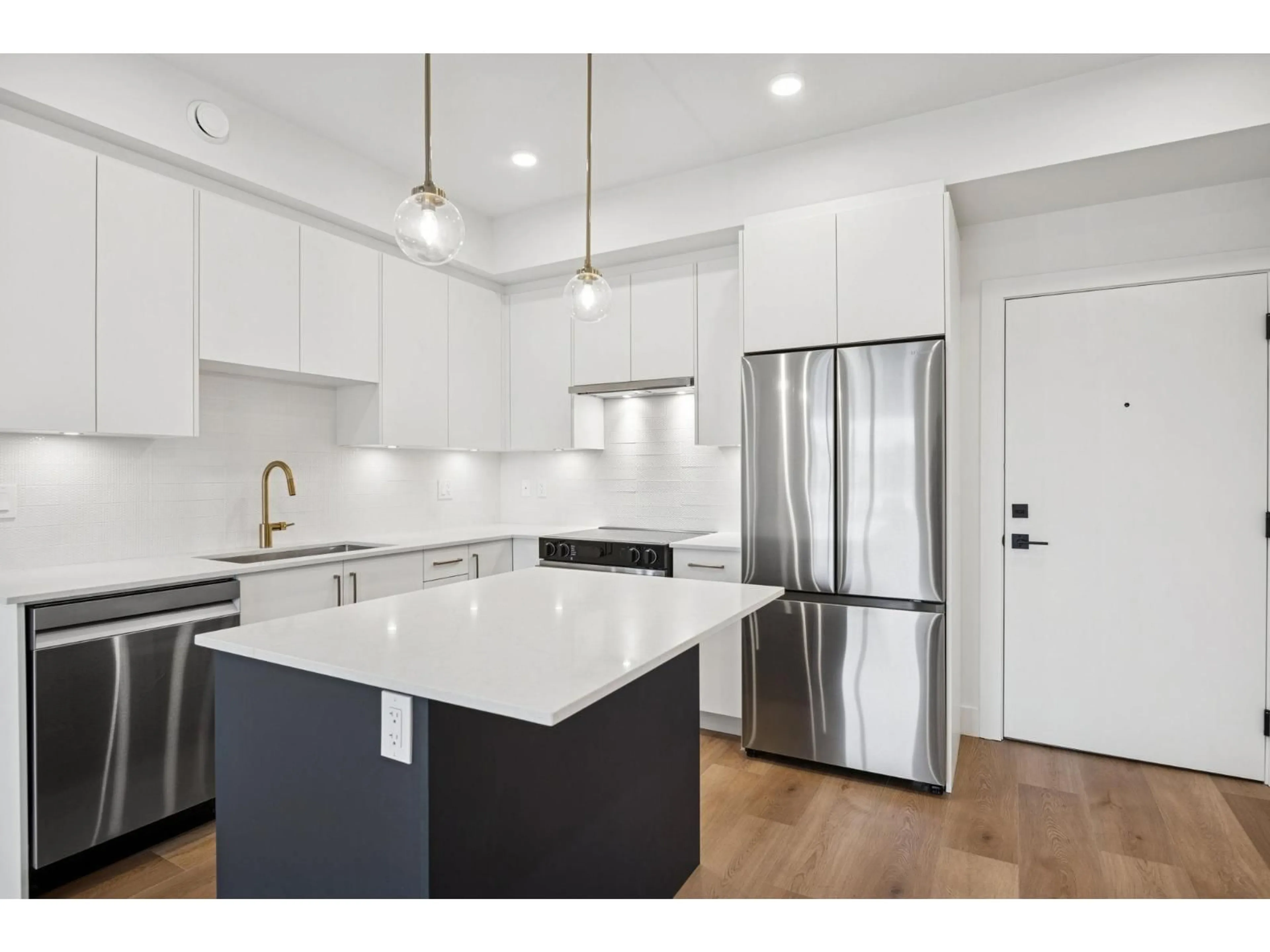 Open concept kitchen, unknown for 414 - 20286 72B AVENUE, Langley British Columbia V2Y1T2