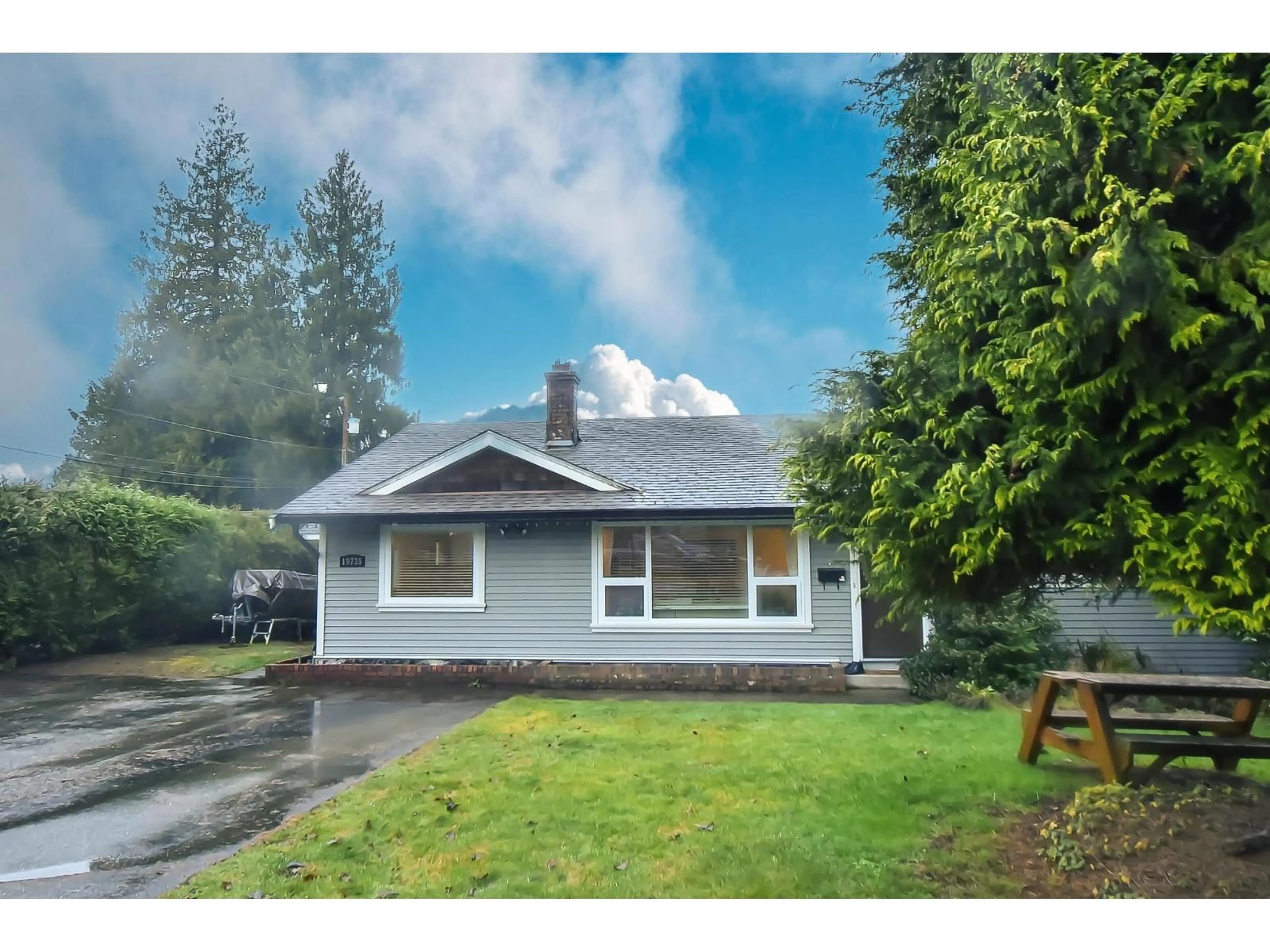 Home with vinyl exterior material, street for 19735 48 AVENUE, Langley British Columbia V3A3L2