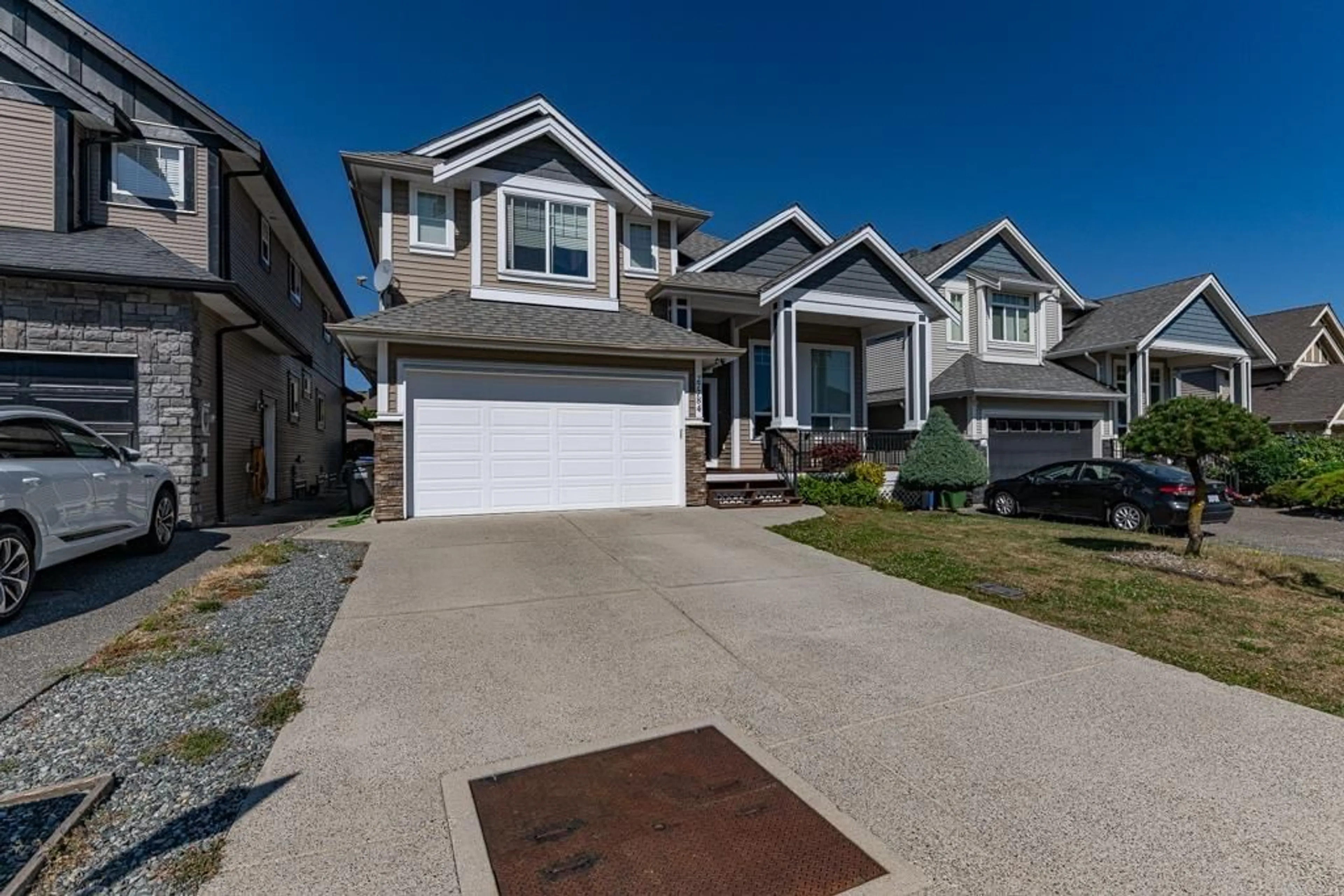 Home with vinyl exterior material, street for 27784 PORTER DRIVE, Abbotsford British Columbia V4X1M3