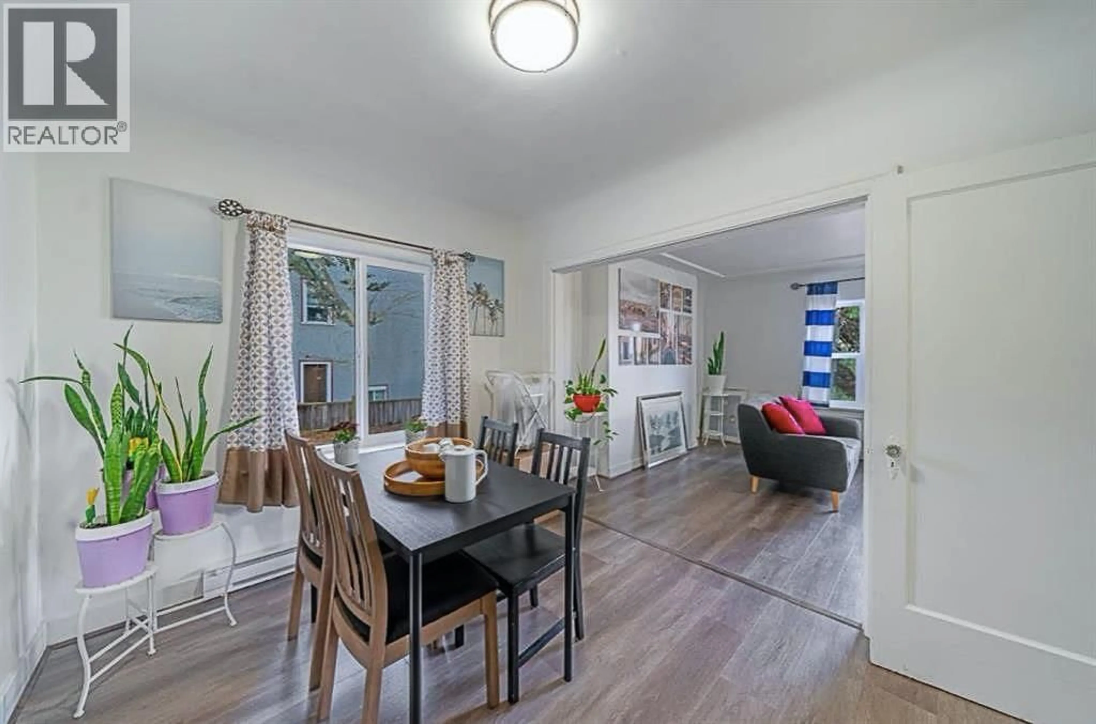Dining room, wood/laminate floor for 3694 16TH AVENUE, Vancouver British Columbia V6R3C4