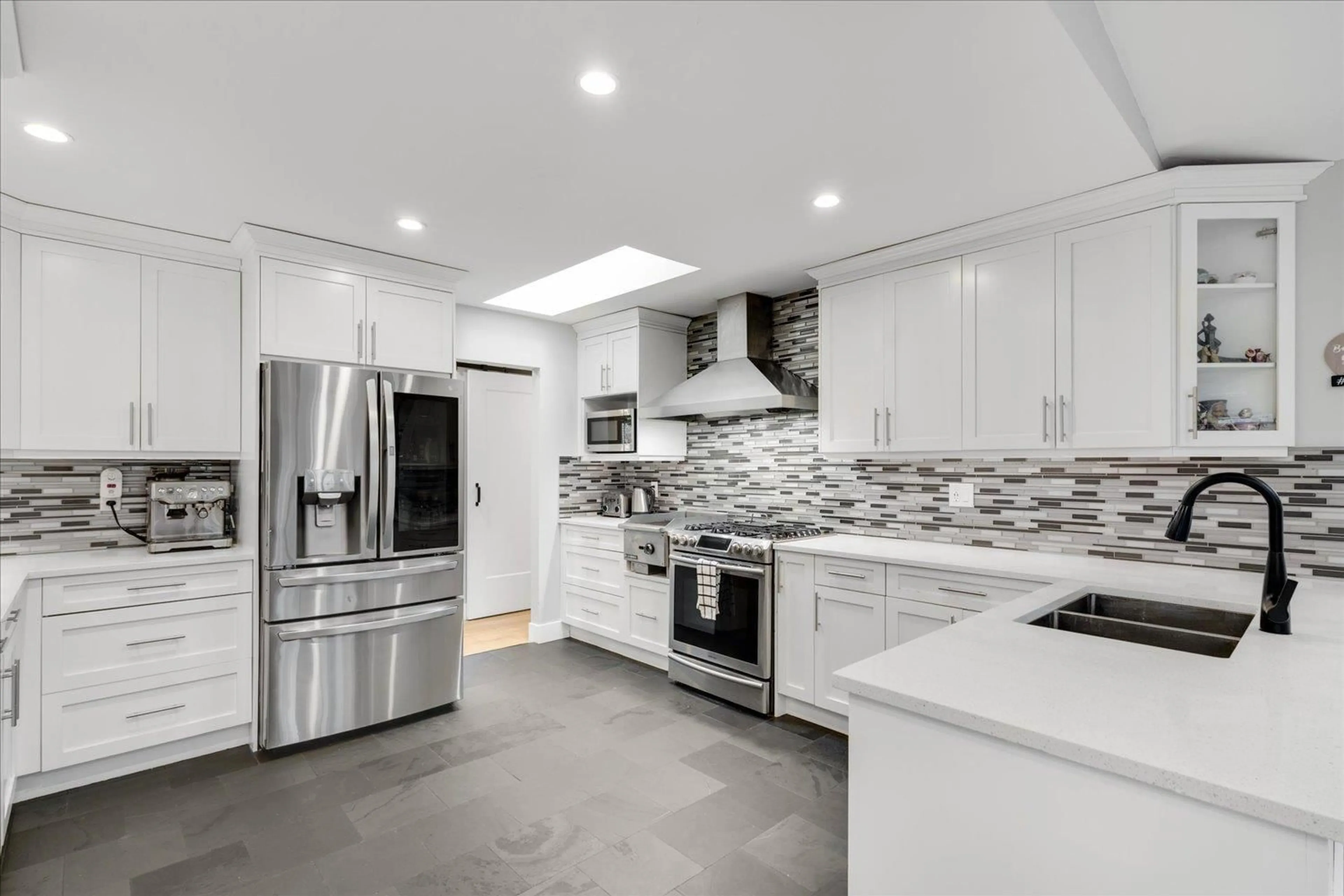 Contemporary kitchen, ceramic/tile floor for 11409 75A AVENUE, Delta British Columbia V4C1H6