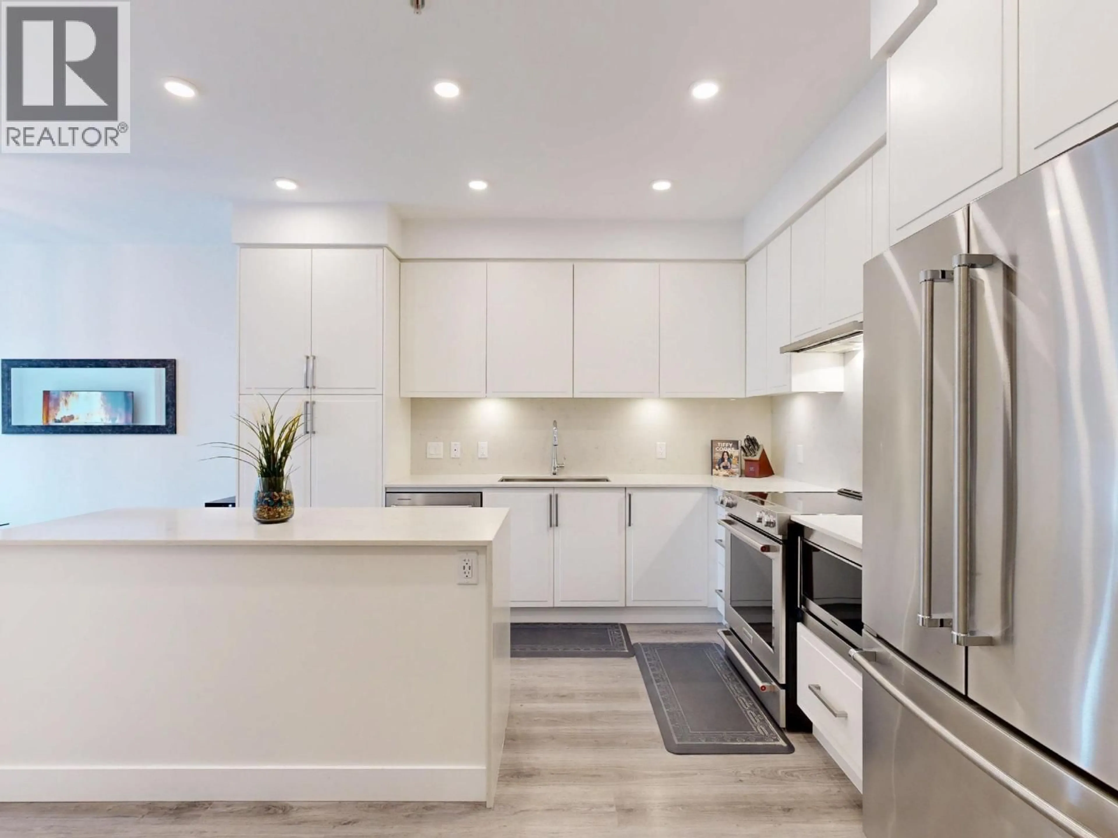 Contemporary kitchen, ceramic/tile floor for 513 - 700 CLARKE ROAD, Coquitlam British Columbia V3J0K5