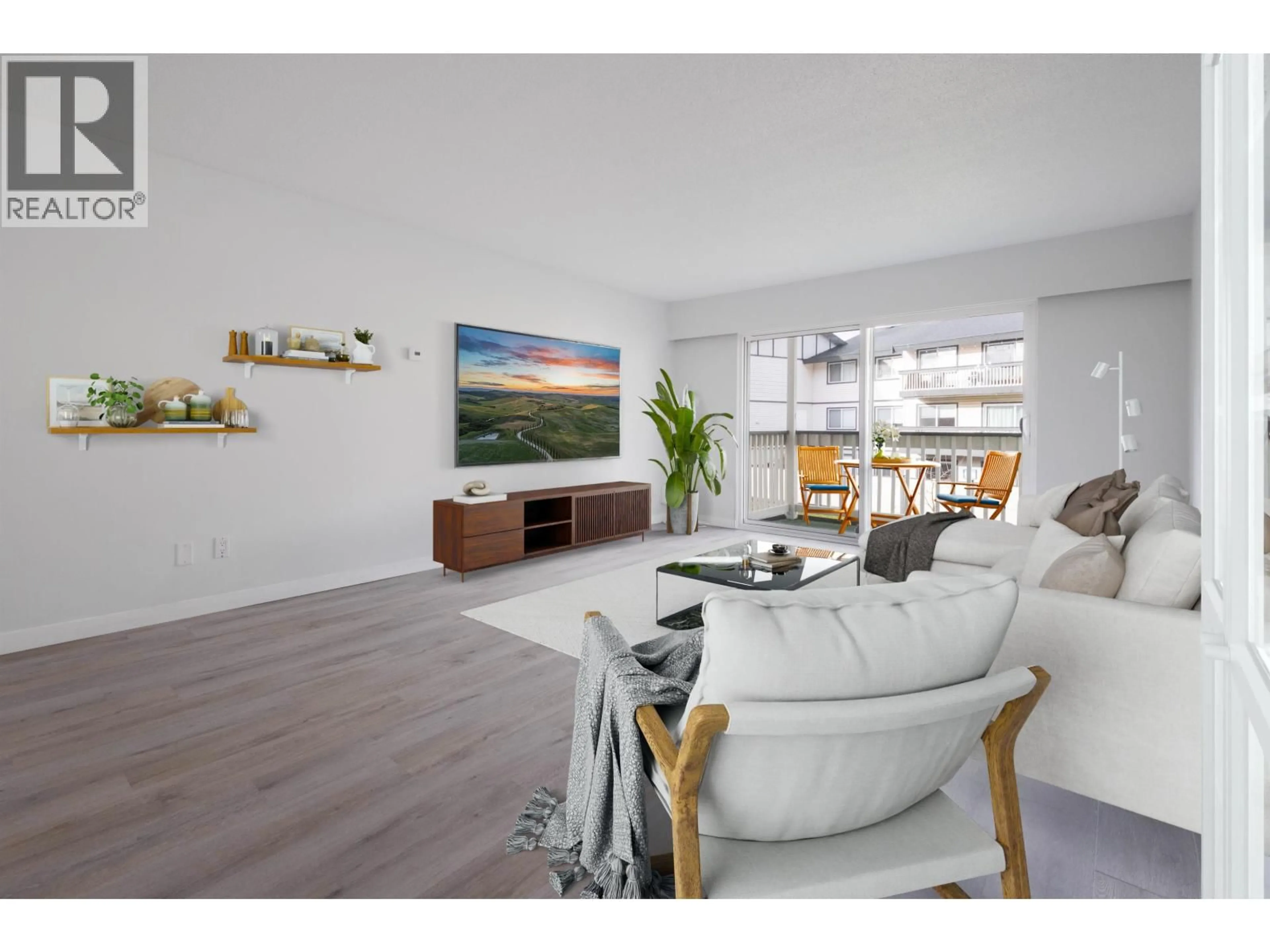 Living room with furniture, wood/laminate floor for 216 - 780 PREMIER STREET, North Vancouver British Columbia V7J2G8