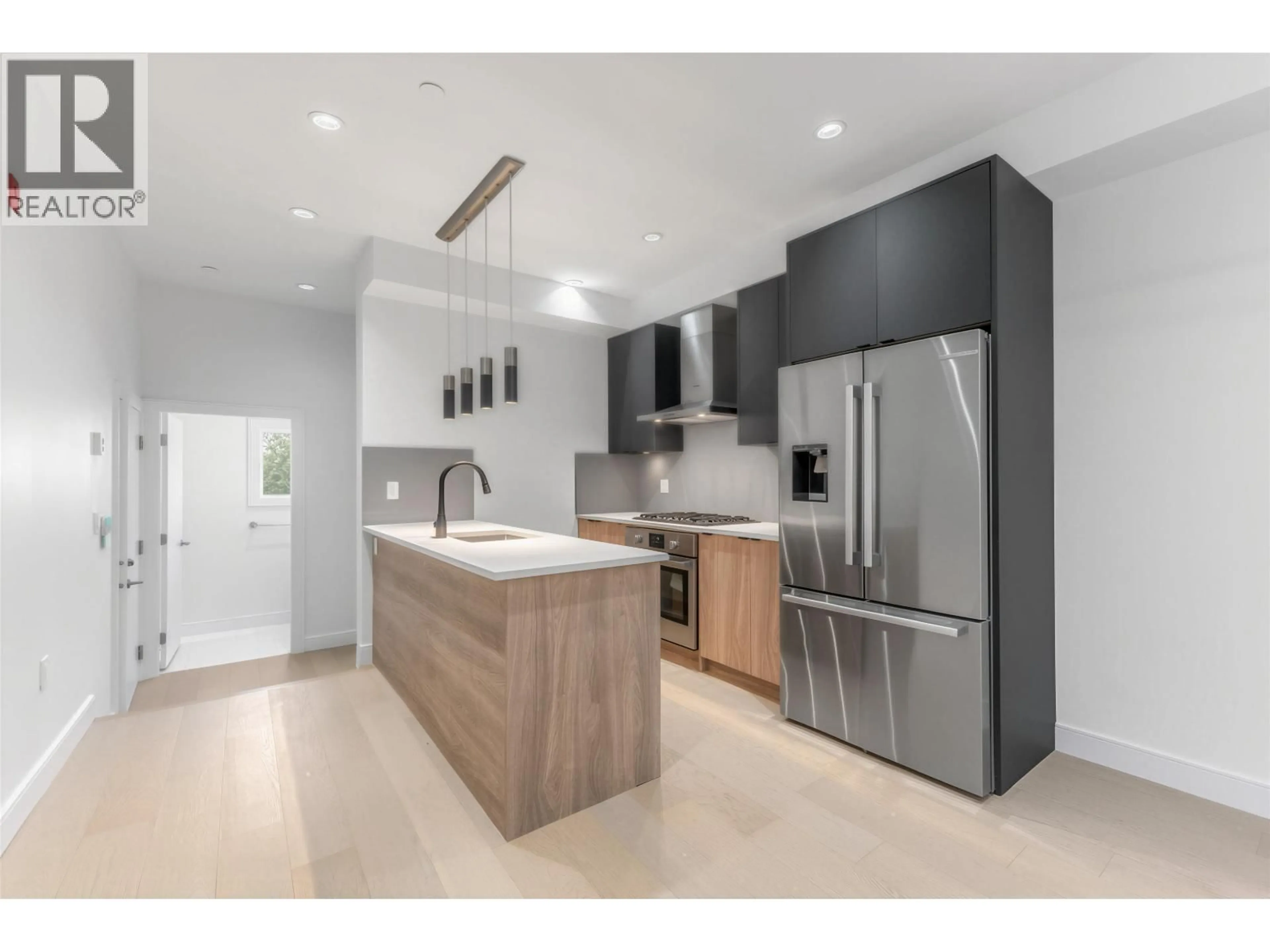 Open concept kitchen, unknown for 7353 OAK STREET, Vancouver British Columbia V6P1V9