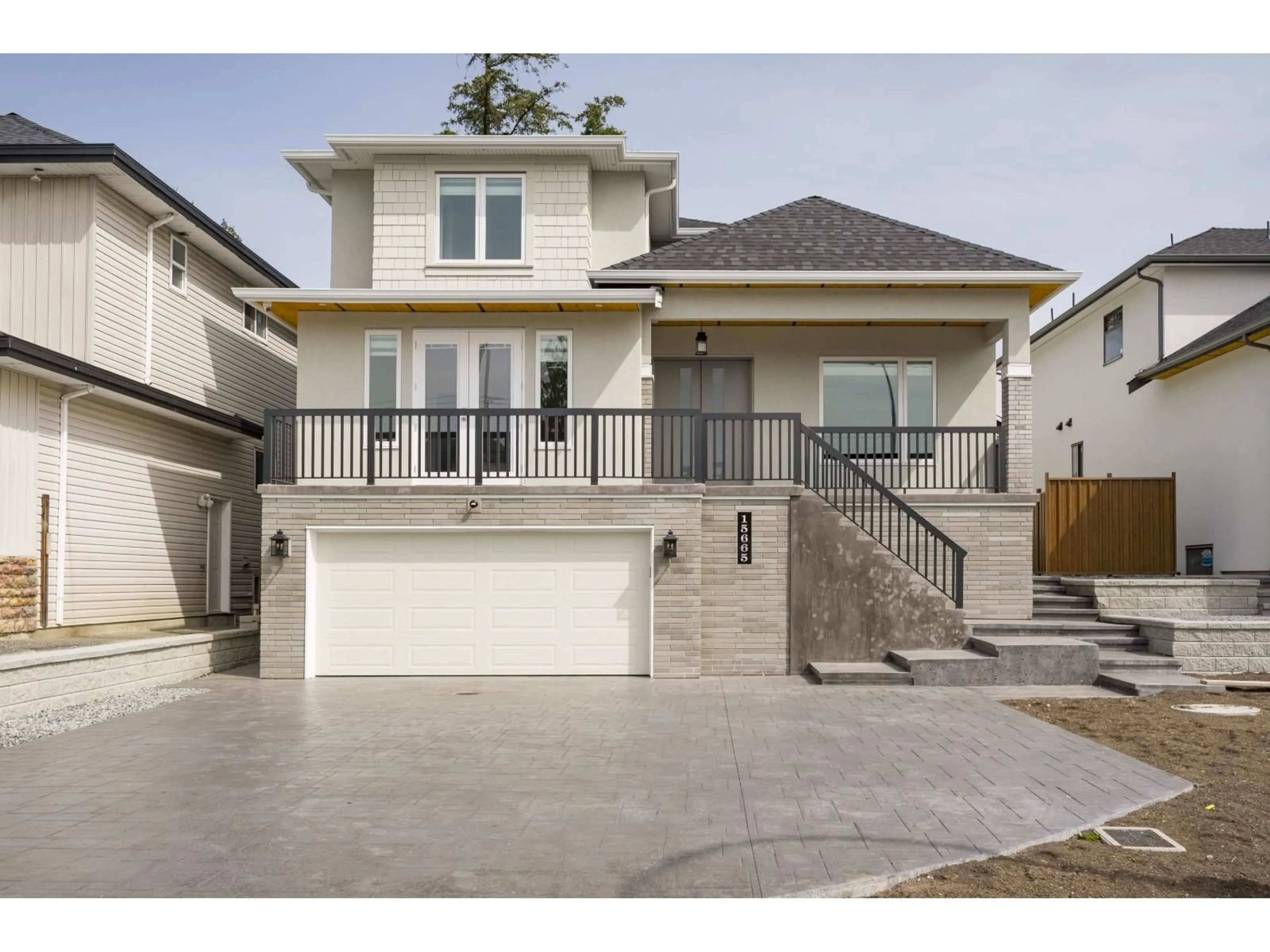 Home with vinyl exterior material, street for 15665 82 AVENUE, Surrey British Columbia V4N0R9