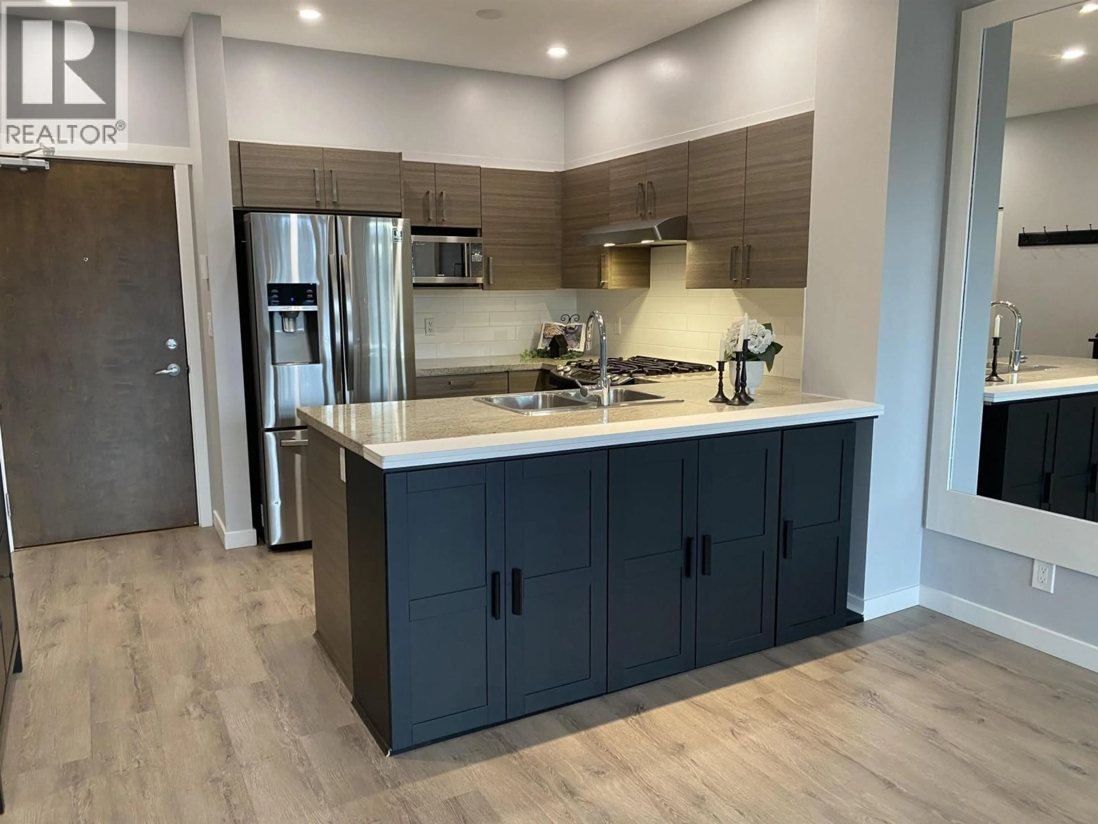 Open concept kitchen, ceramic/tile floor for 409 - 1153 KENSAL PLACE, Coquitlam British Columbia V3B0G8