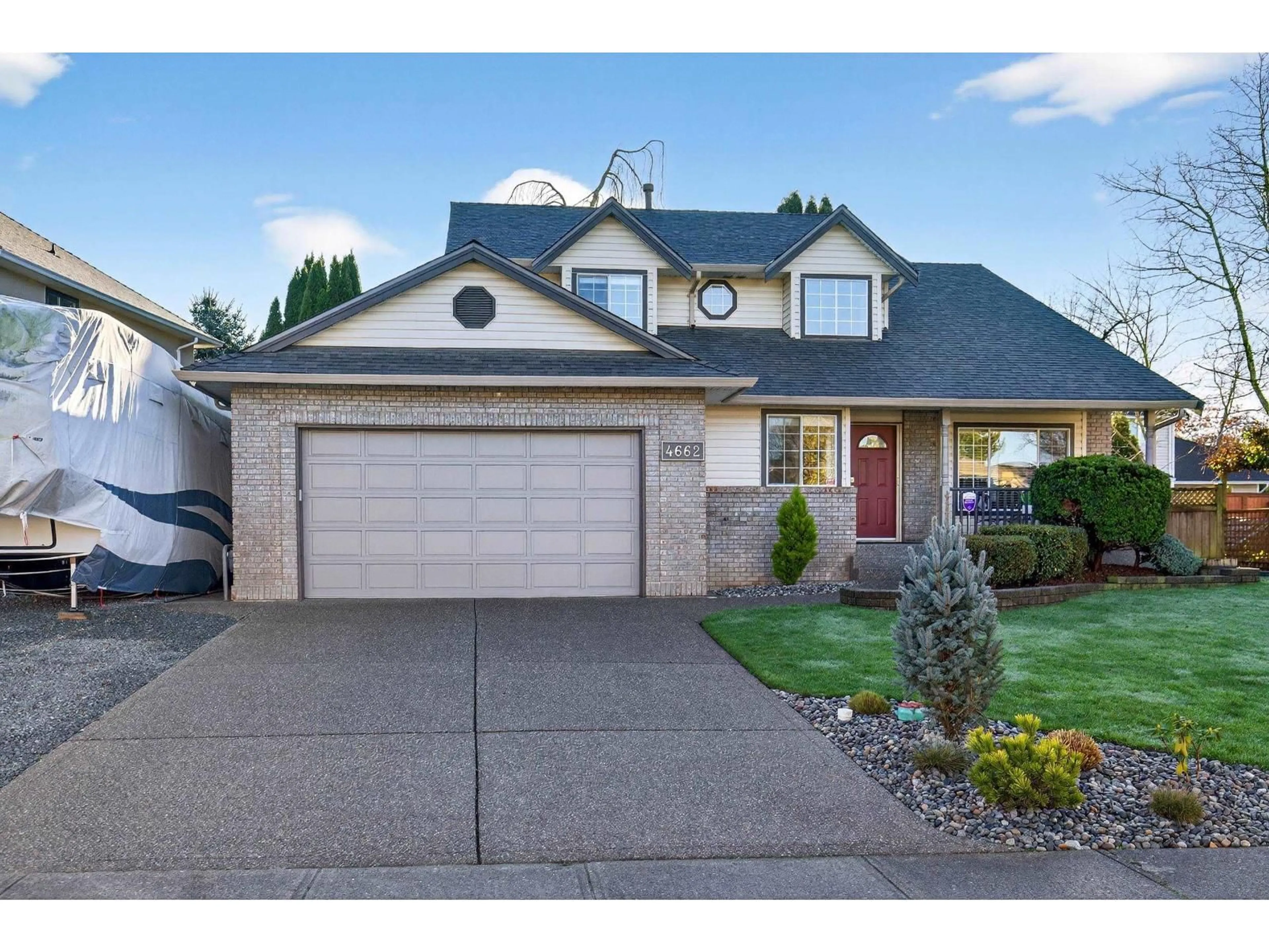 Home with vinyl exterior material, street for 4662 221 STREET, Langley British Columbia V2Z1A9