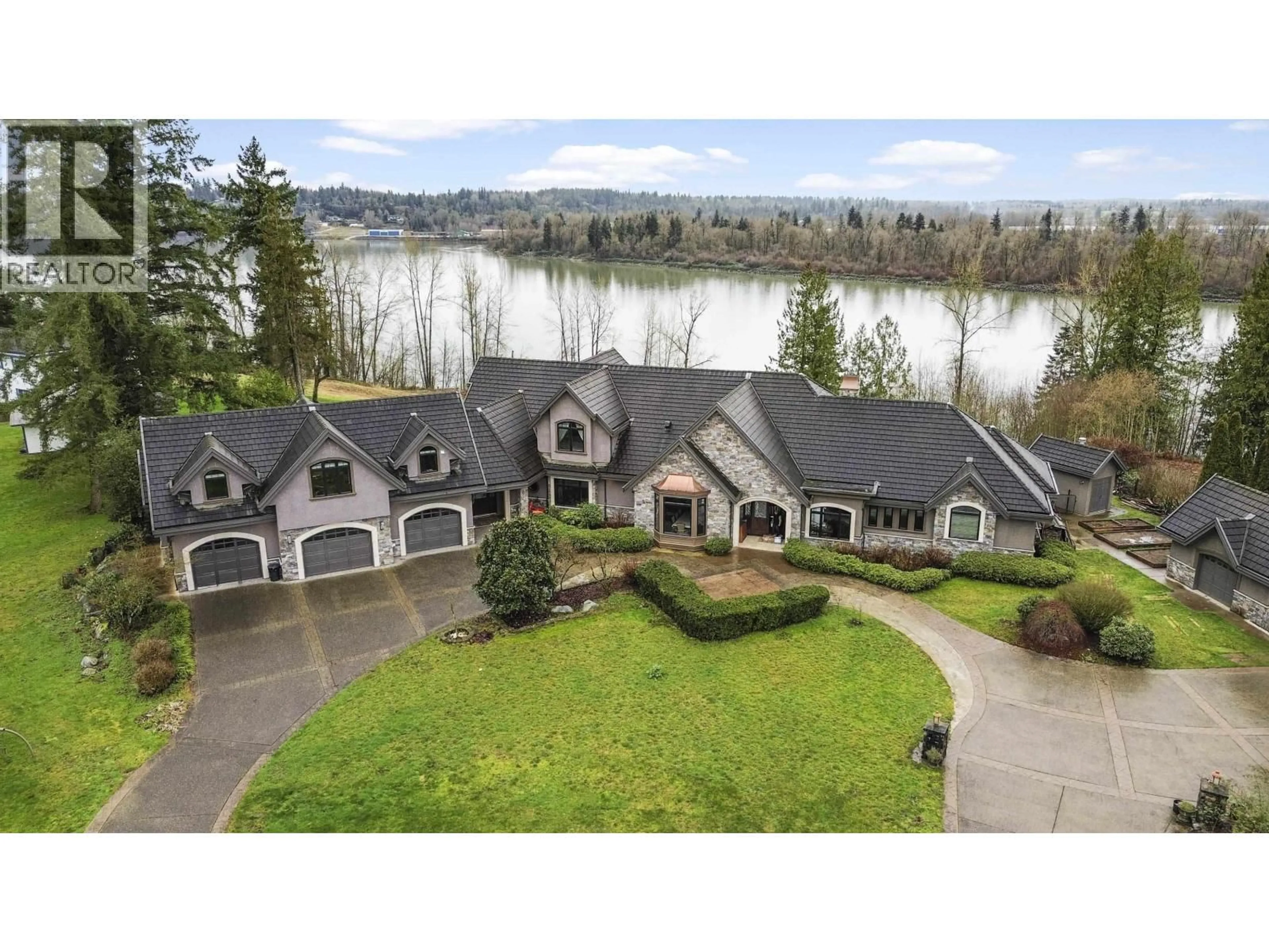A pic from outside/outdoor area/front of a property/back of a property/a pic from drone, water/lake/river/ocean view for 24228 RIVER ROAD, Maple Ridge British Columbia V2W1M2