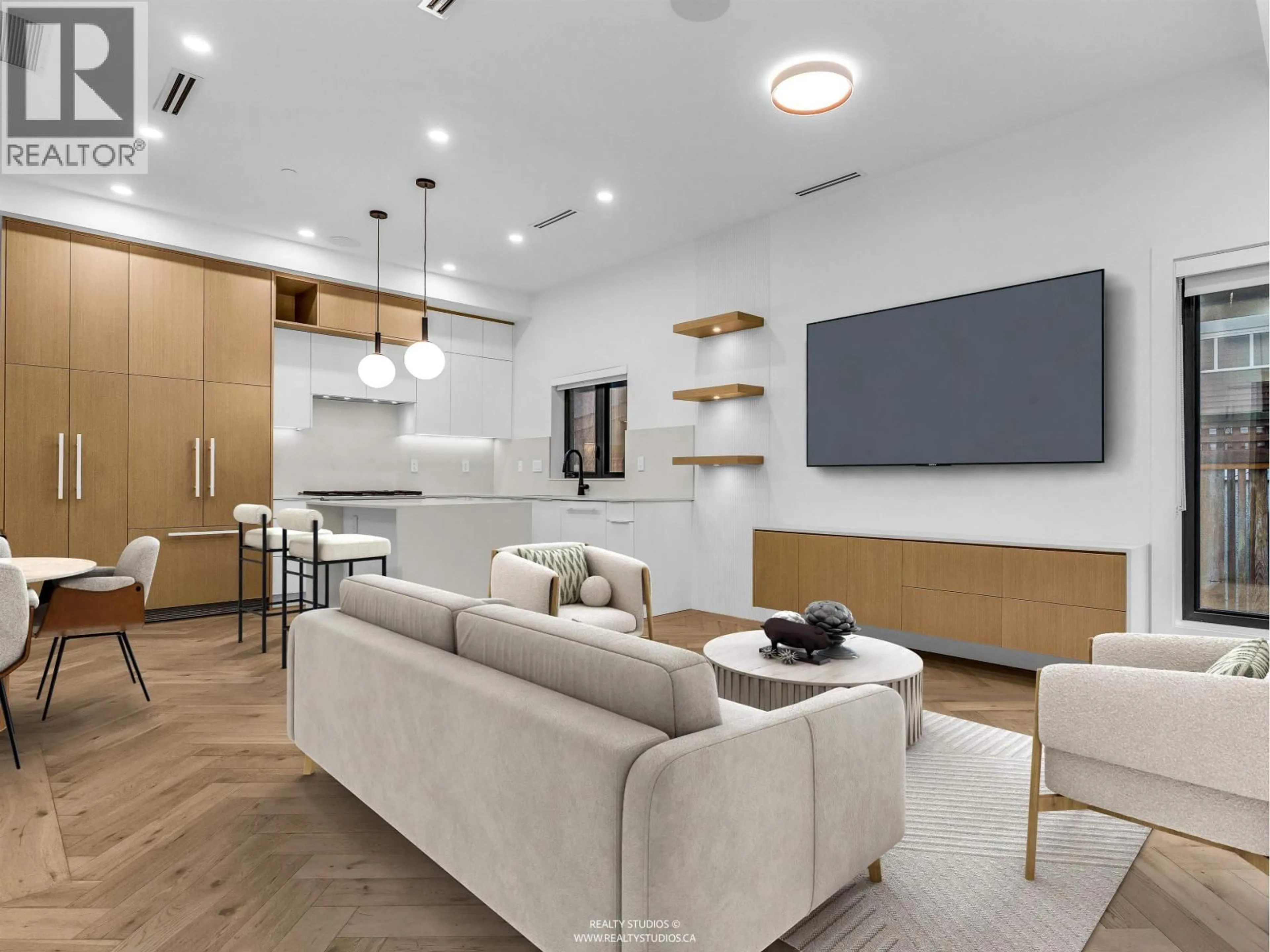 Living room with furniture, wood/laminate floor for 1 - 3118 WINDSOR STREET, Vancouver British Columbia V5T4B1