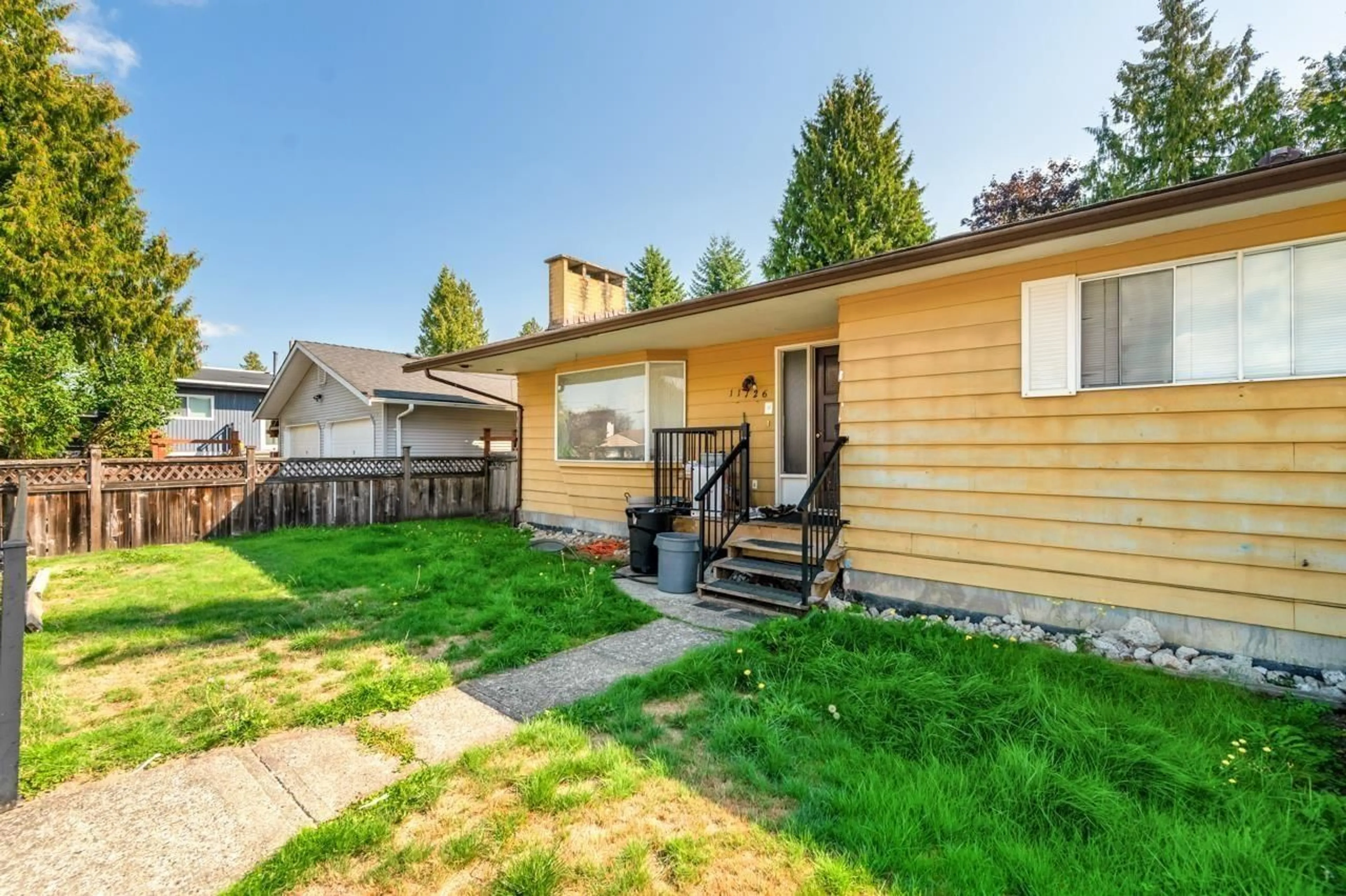 Home with vinyl exterior material, street for 11726 94A AVENUE, Delta British Columbia V4C3S3