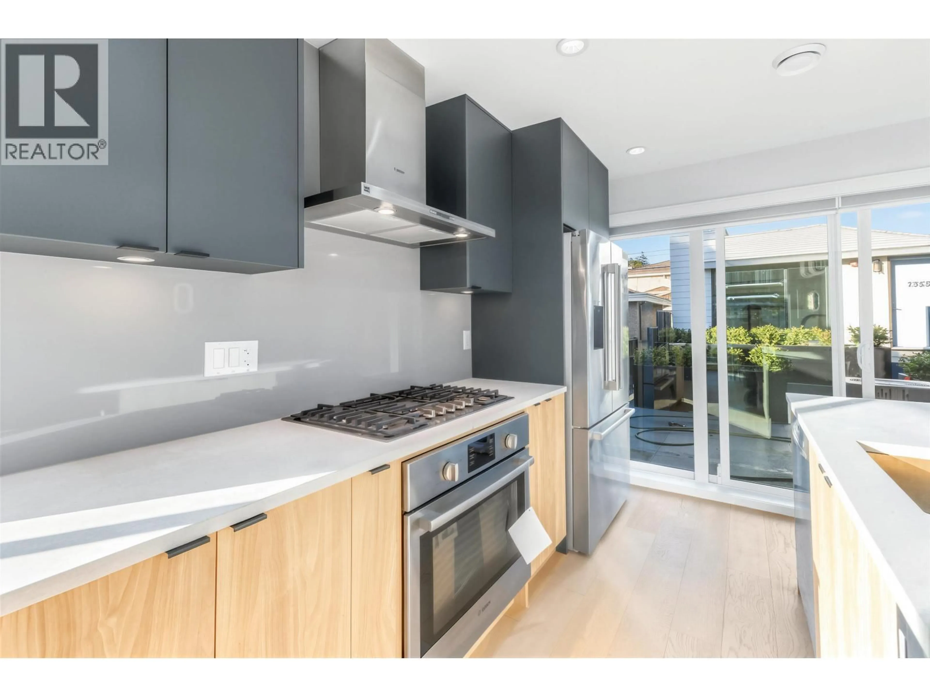 Contemporary kitchen, unknown for 1007 58TH AVENUE, Vancouver British Columbia V6P1V9