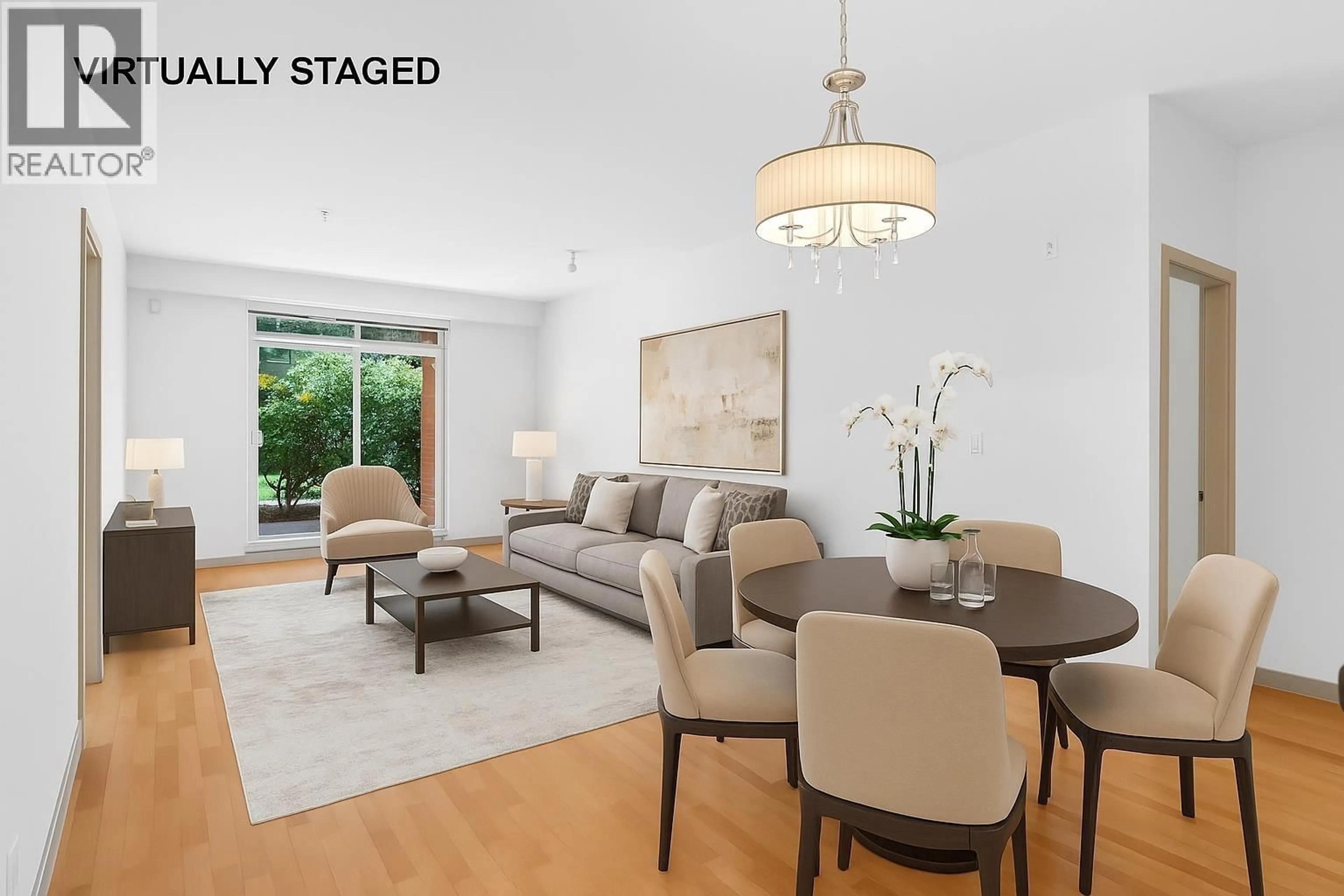 Living room with furniture, wood/laminate floor for 111 - 100 CAPILANO ROAD, Port Moody British Columbia V3H5M9