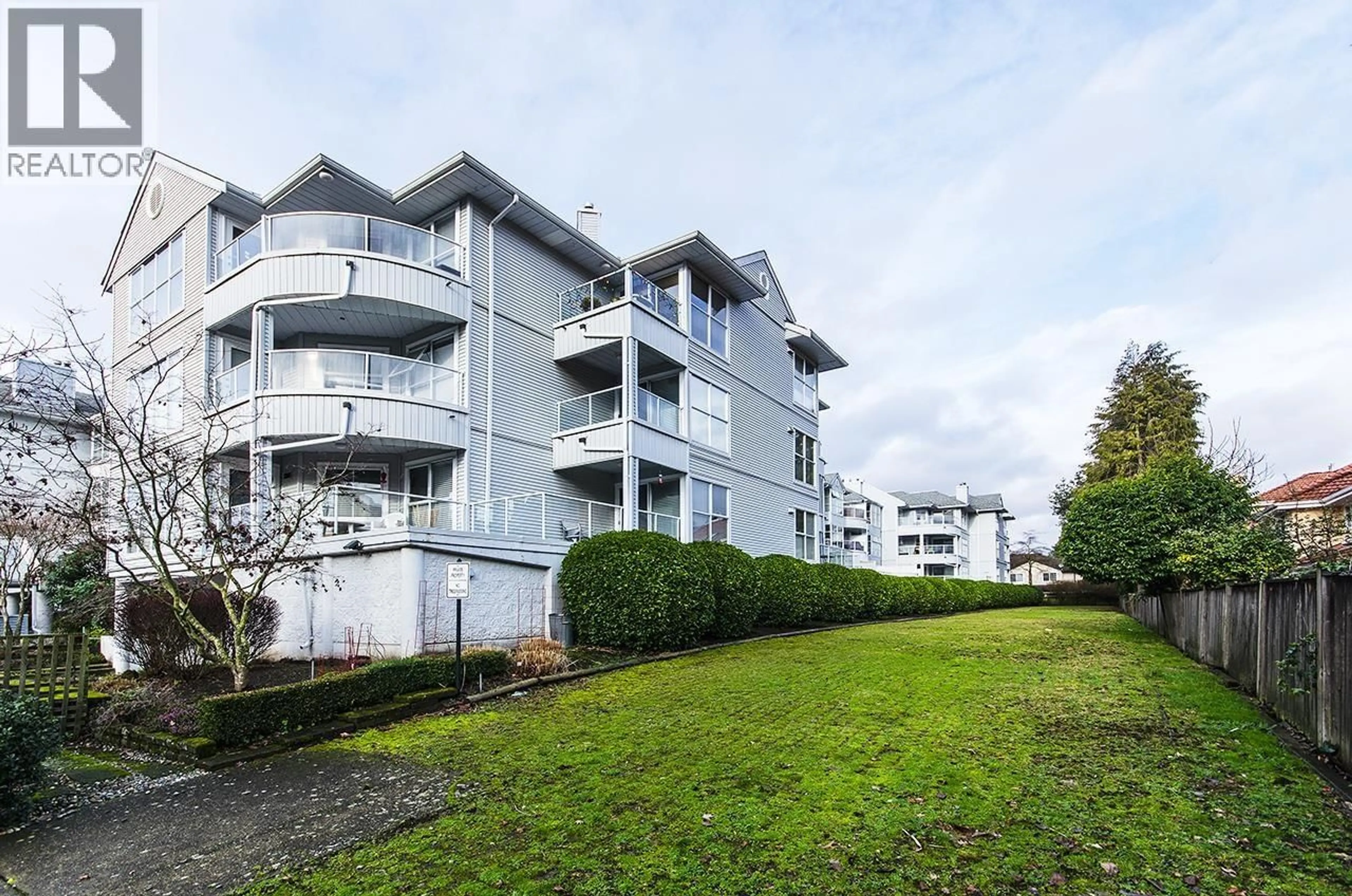 A pic from outside/outdoor area/front of a property/back of a property/a pic from drone, building for 309 - 8611 GENERAL CURRIE ROAD, Richmond British Columbia V6Y3W4