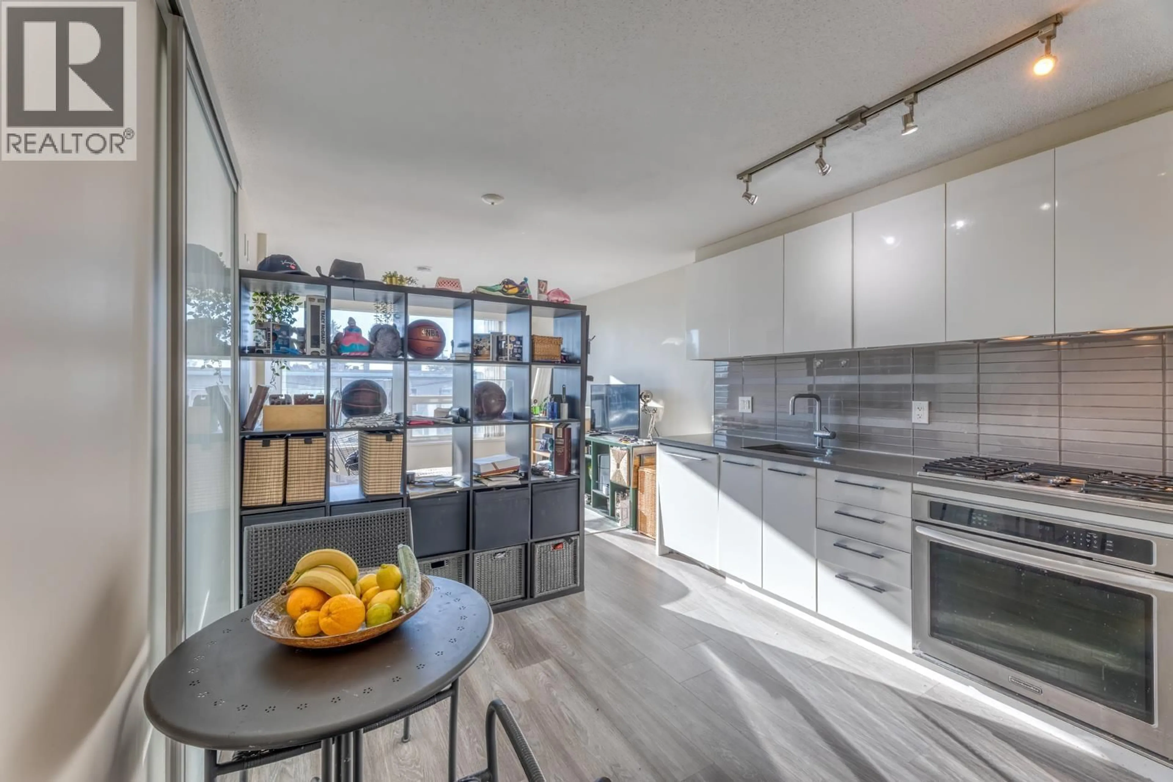 Contemporary kitchen, ceramic/tile floor for 203 - 6658 DOW AVENUE, Burnaby British Columbia V5H0C7