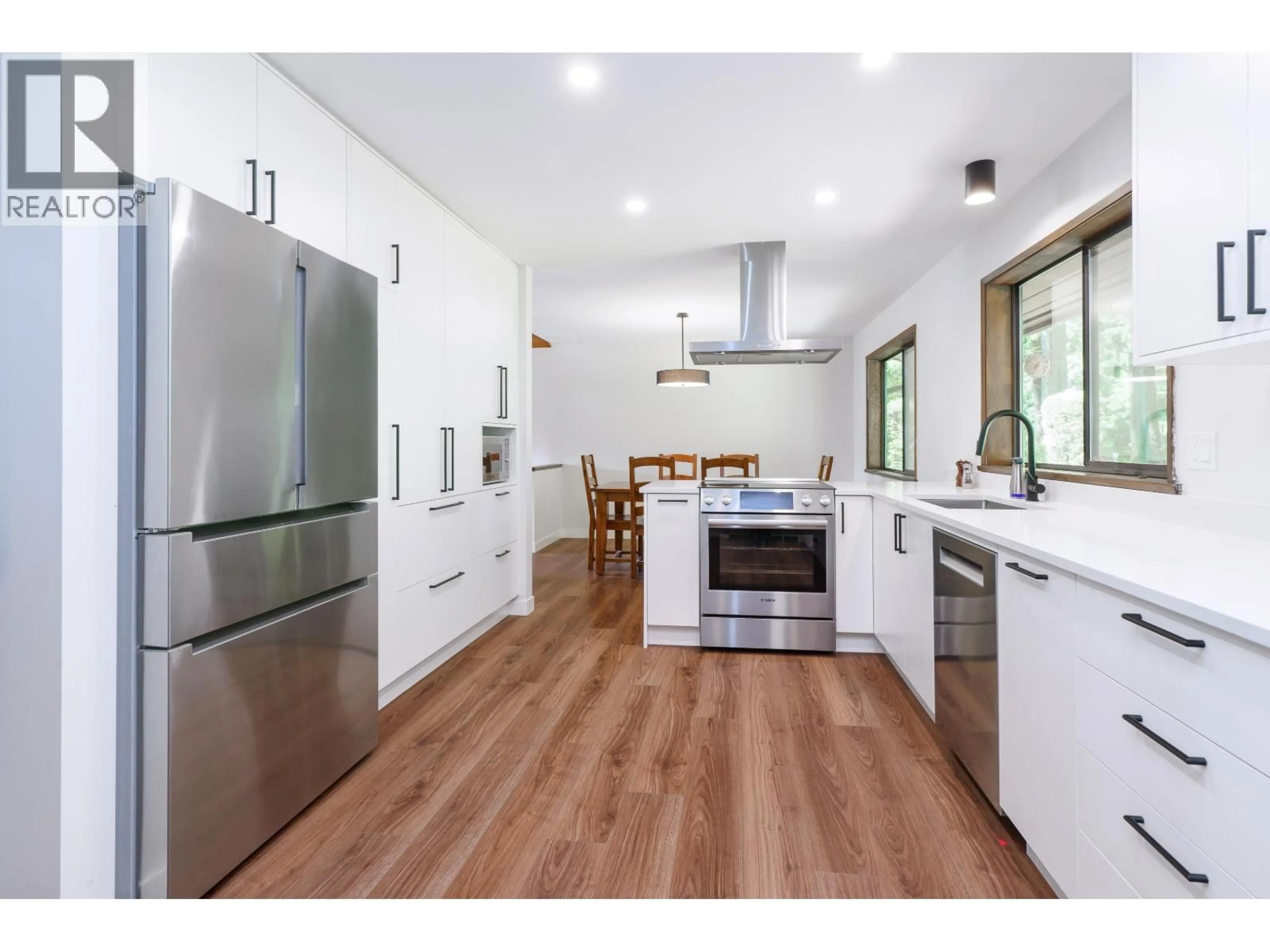 Open concept kitchen, wood/laminate floor for 27573 SAYERS CRESCENT, Maple Ridge British Columbia V2W1N3
