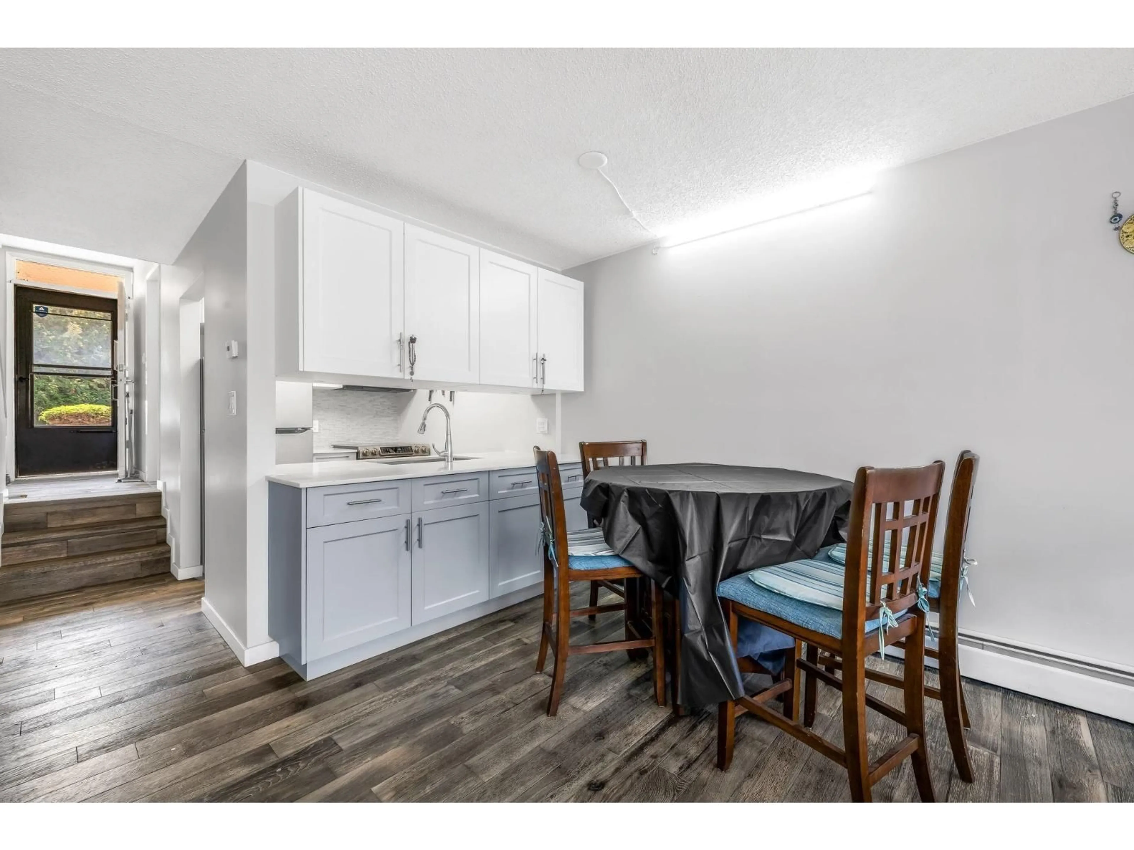 Open concept kitchen, wood/laminate floor for 47 - 17708 60 AVENUE, Surrey British Columbia V3S1V2