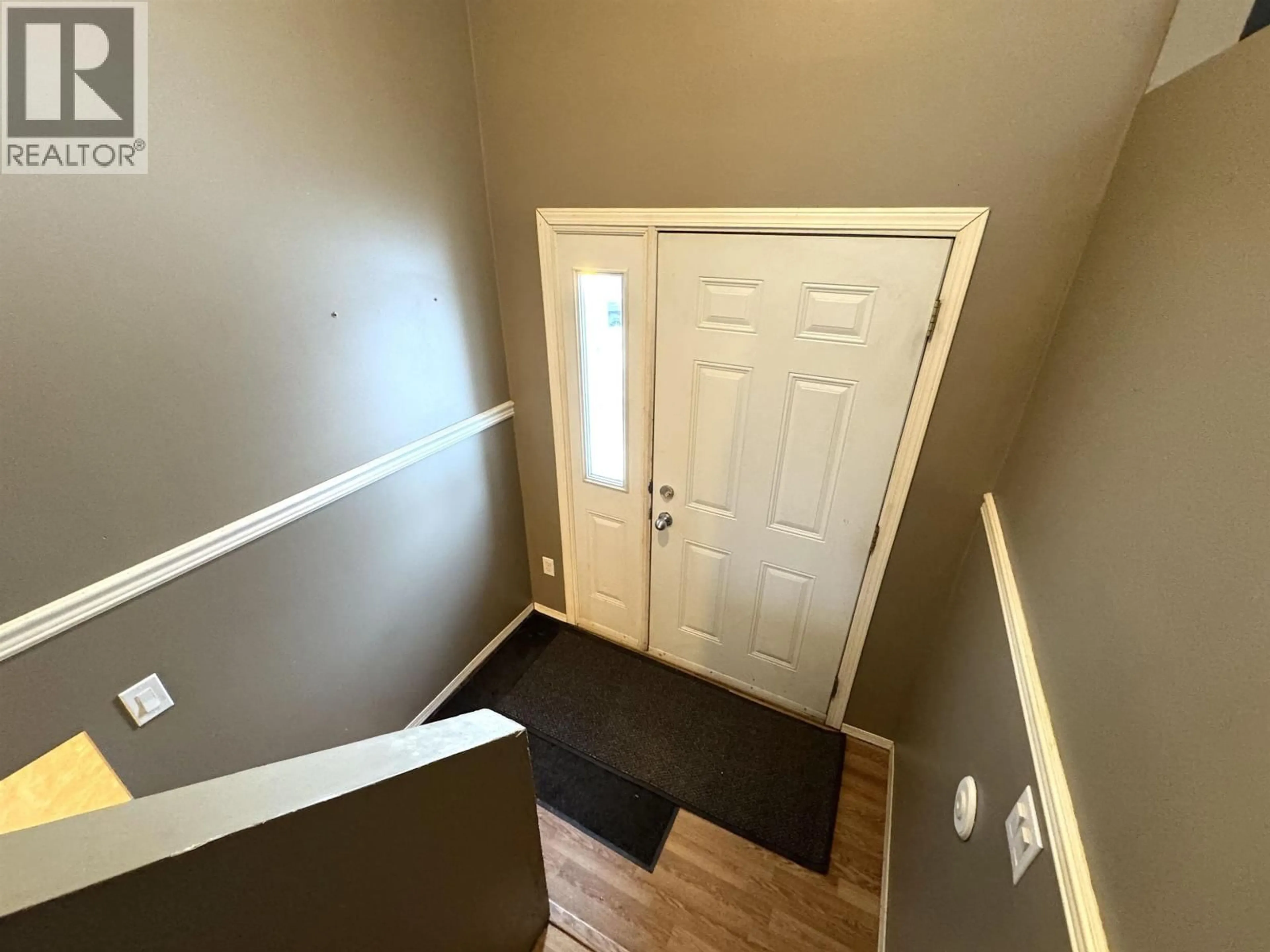 Indoor entryway for 9016 98A AVENUE, Fort St. John British Columbia V1J5E4