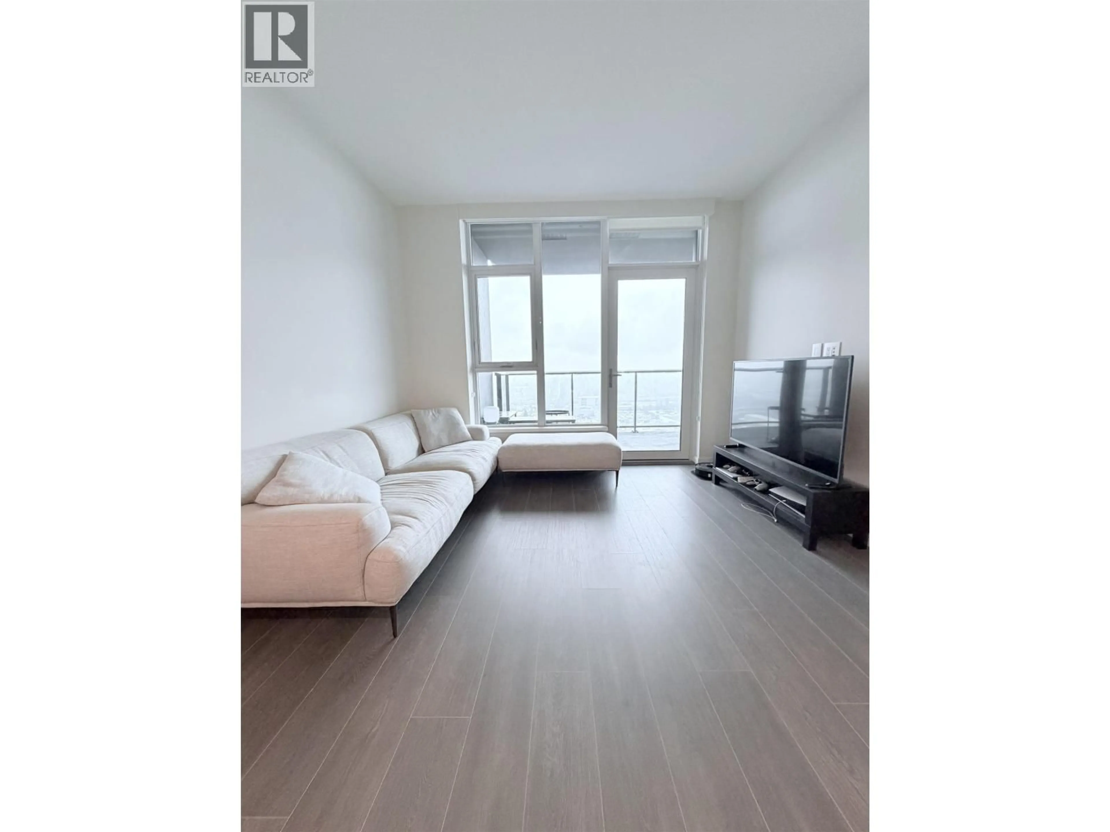 Living room with furniture, unknown for 2803 - 2108 GILMORE AVENUE, Burnaby British Columbia V5C0N8