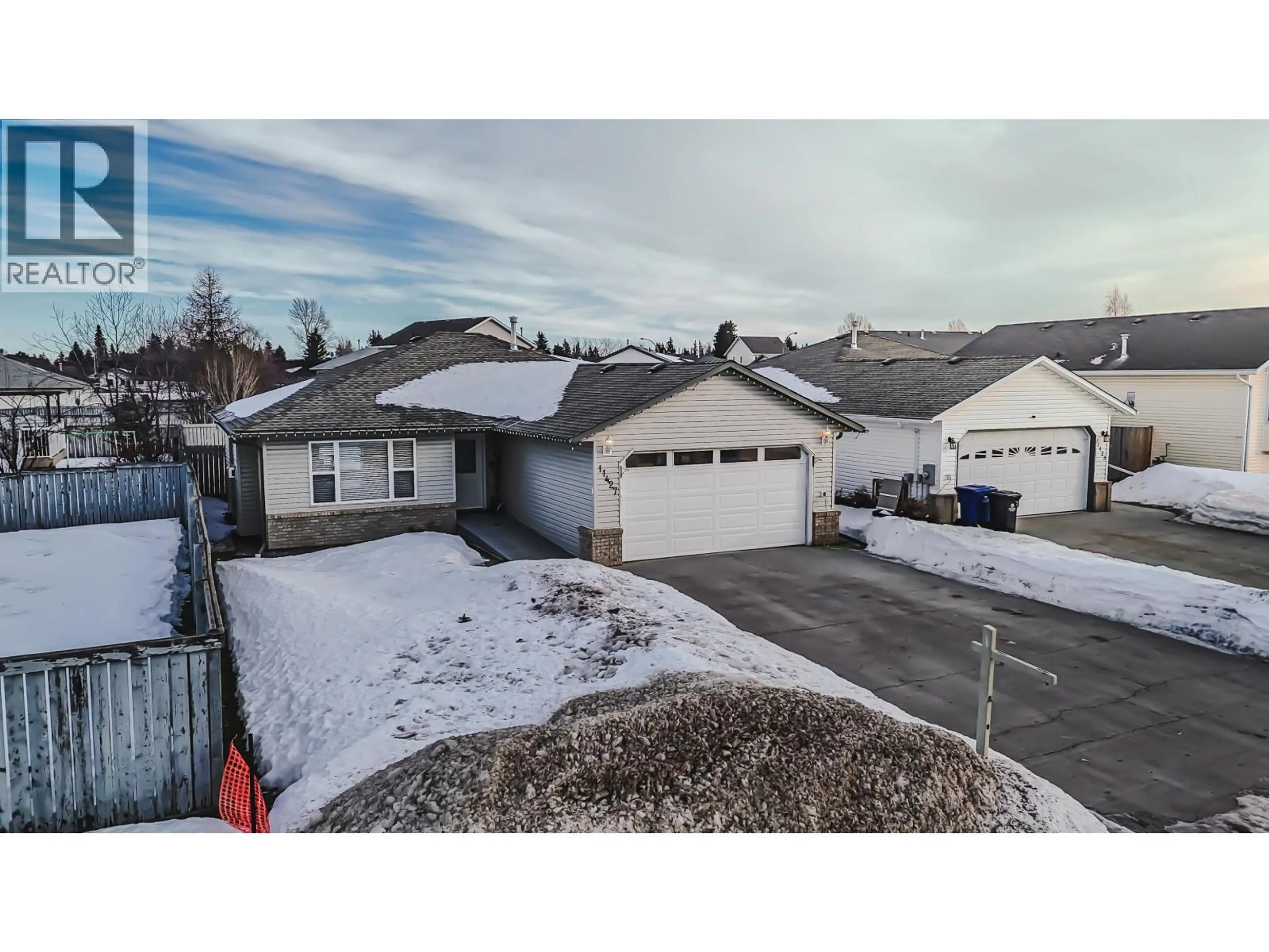 A pic from outside/outdoor area/front of a property/back of a property/a pic from drone, street for 11427 98 STREET, Fort St. John British Columbia V1J7B5