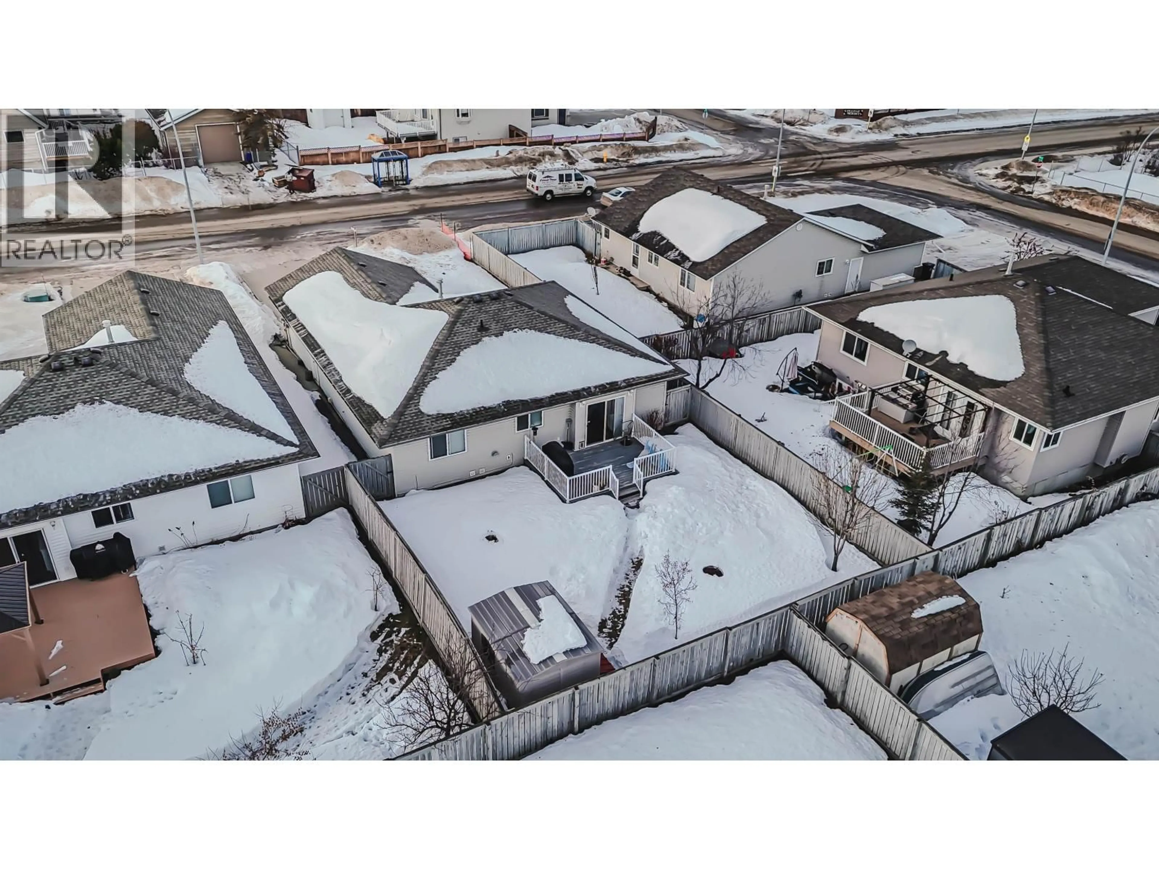 A pic from outside/outdoor area/front of a property/back of a property/a pic from drone, street for 11427 98 STREET, Fort St. John British Columbia V1J7B5