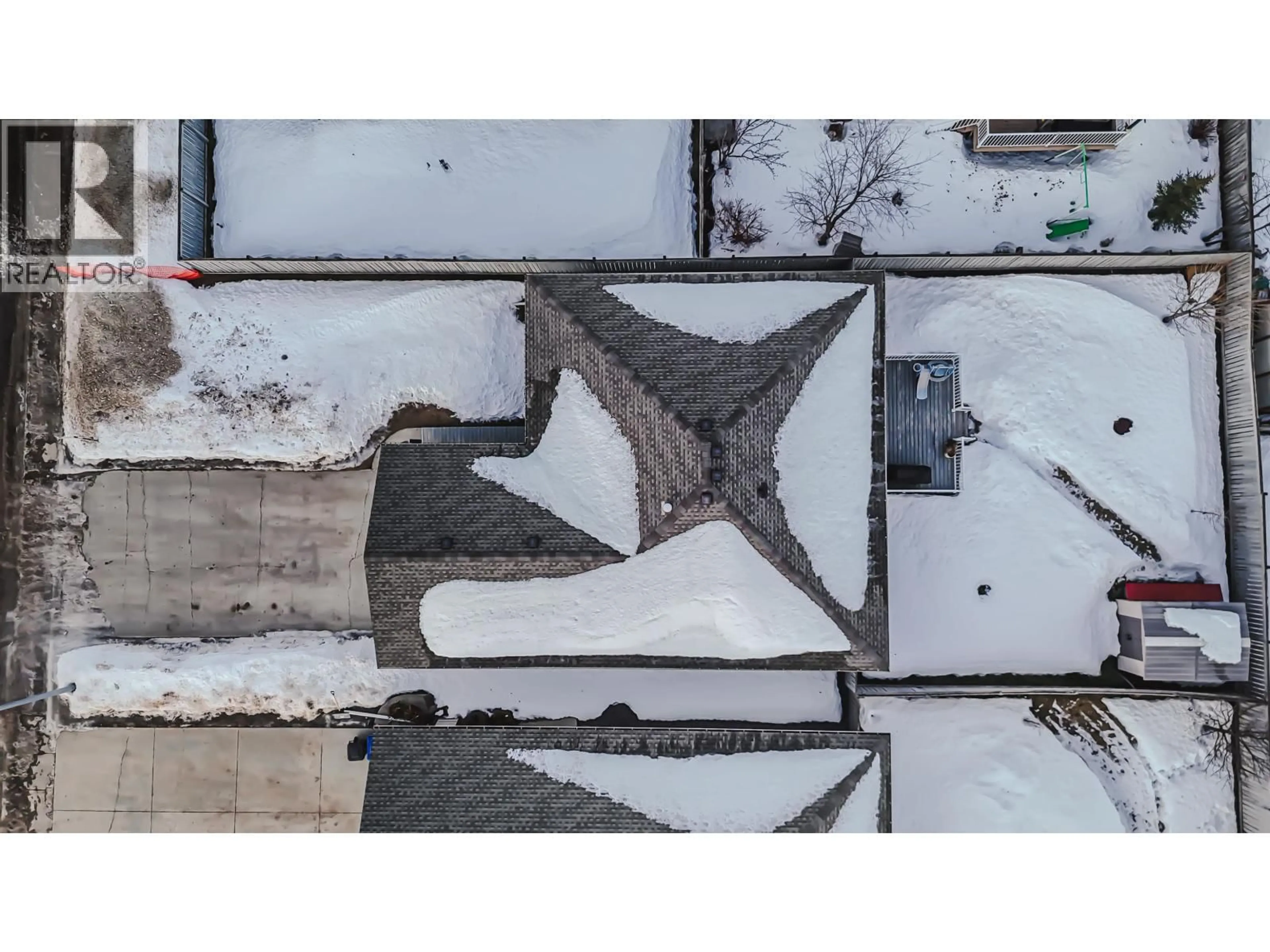 A pic from outside/outdoor area/front of a property/back of a property/a pic from drone, building for 11427 98 STREET, Fort St. John British Columbia V1J7B5