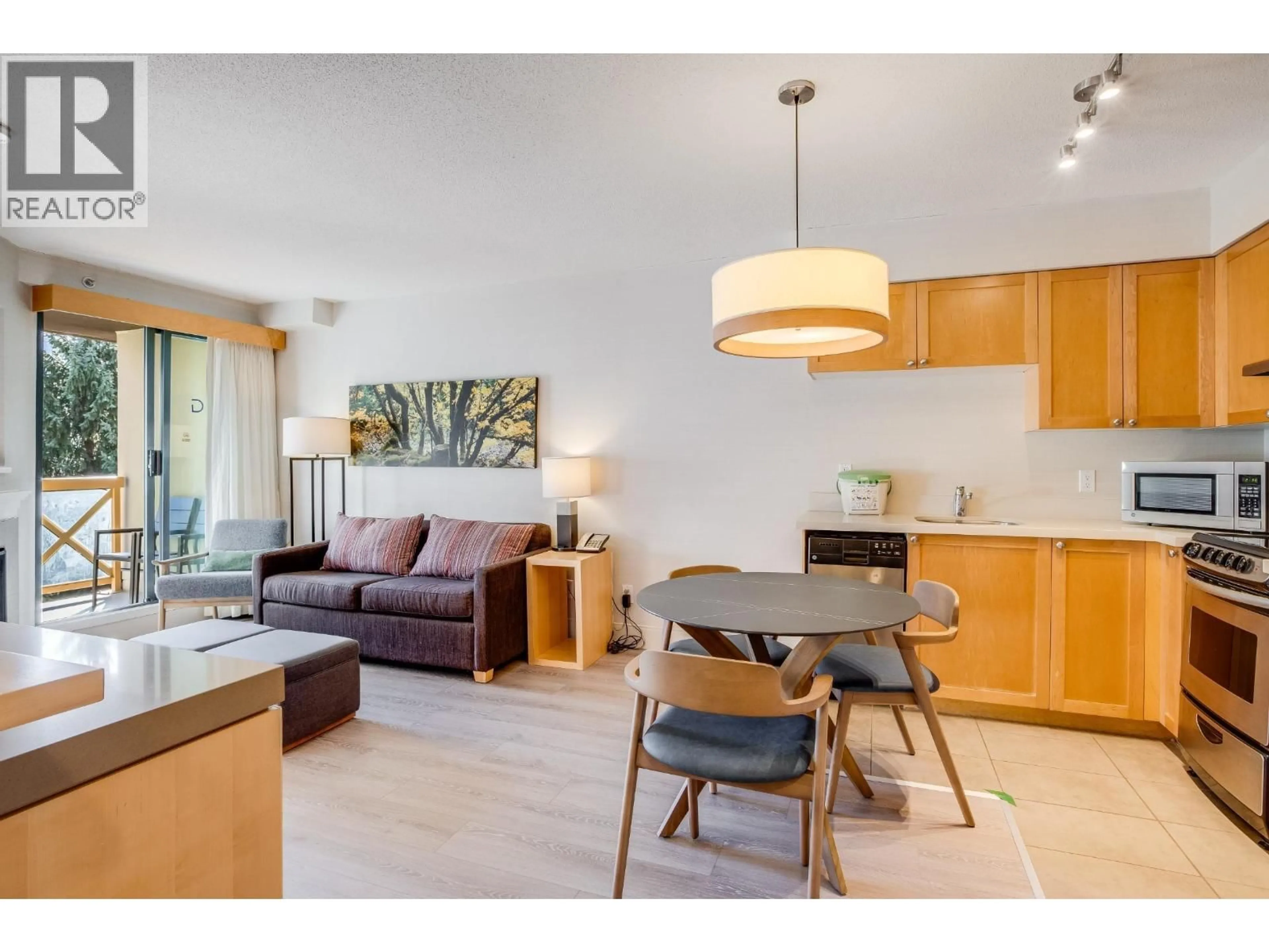 Living room with furniture, wood/laminate floor for 1509 - 4308 MAIN STREET, Whistler British Columbia V8E1A9