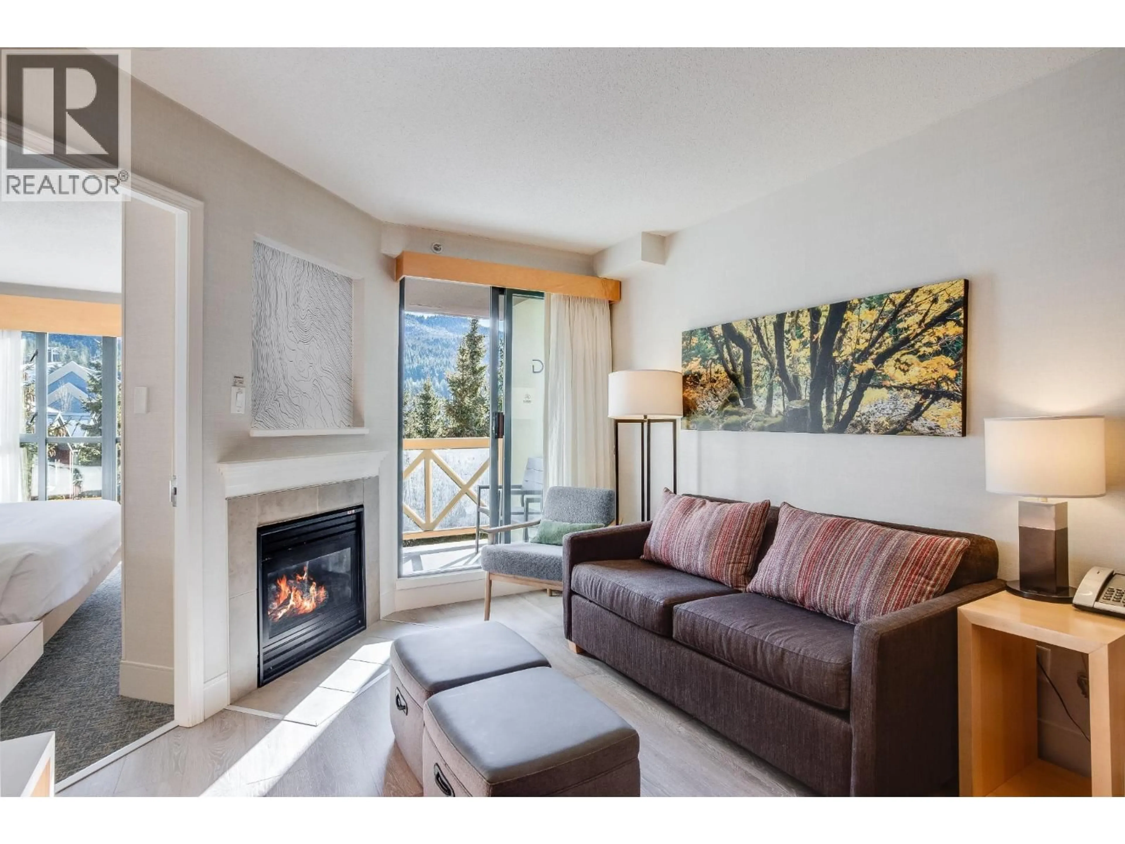 Living room with furniture, wood/laminate floor for 1509 - 4308 MAIN STREET, Whistler British Columbia V8E1A9