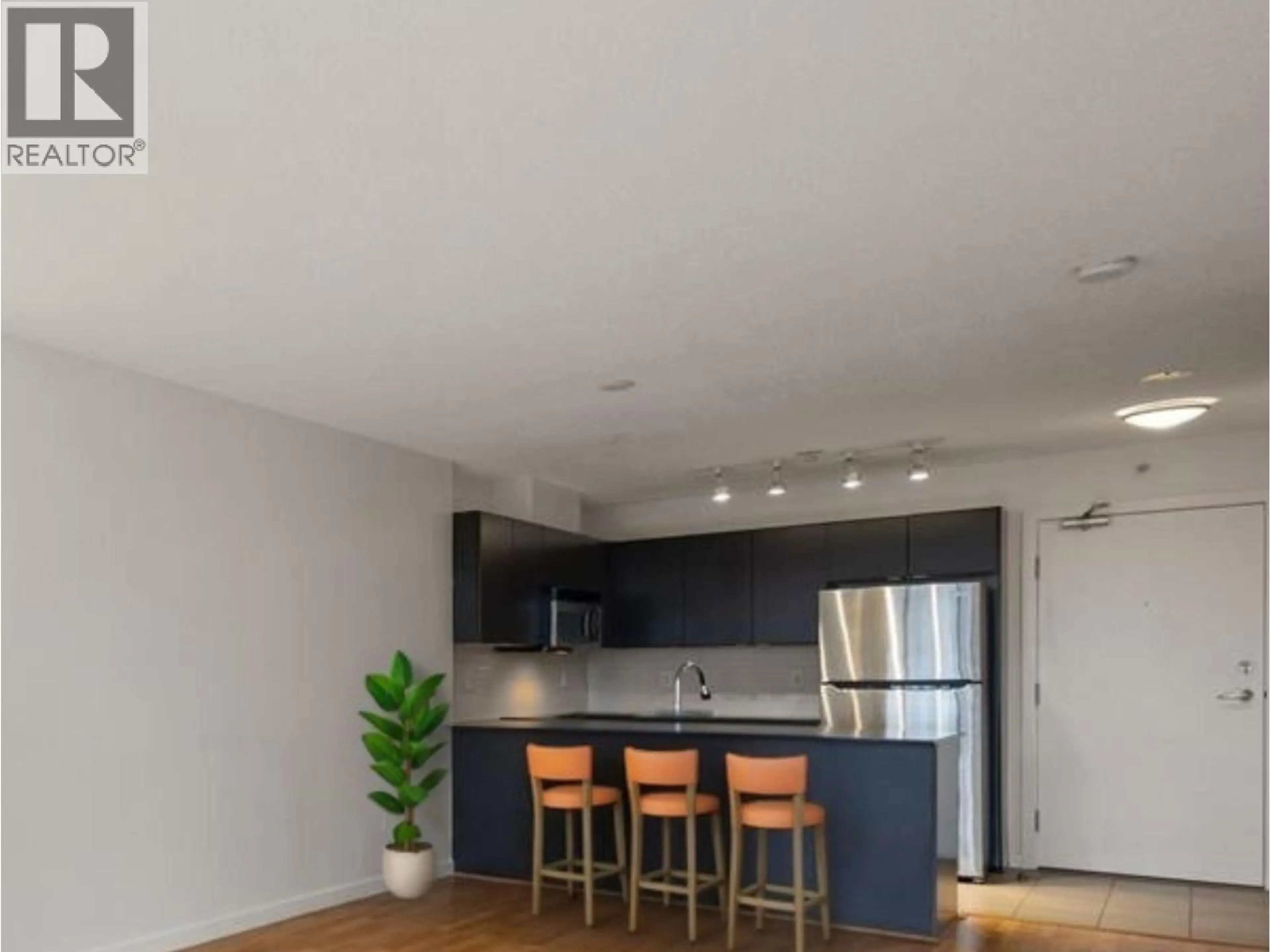 Open concept kitchen, wood/laminate floor for 1107 - 4178 DAWSON STREET, Burnaby British Columbia V5C0A1