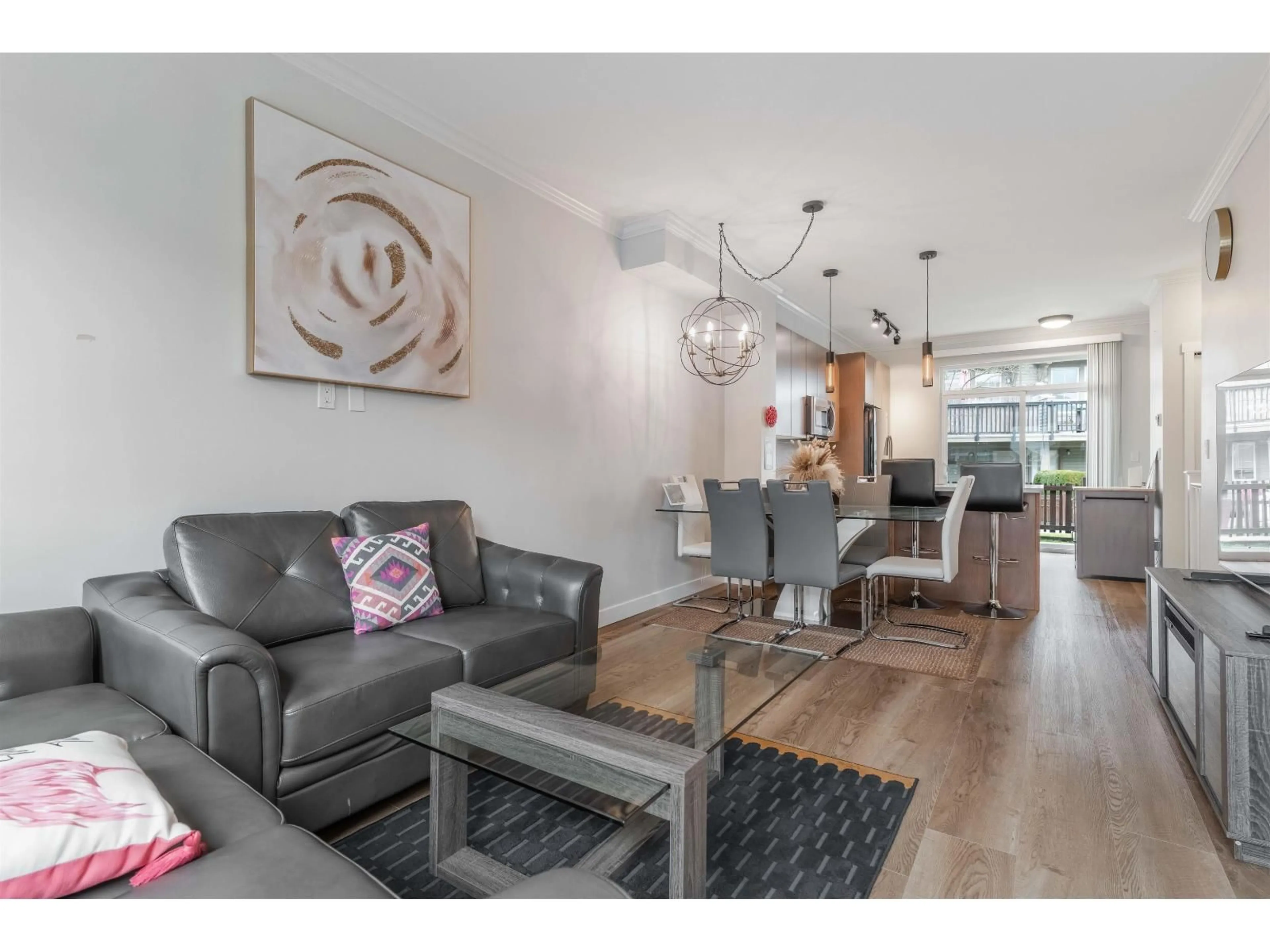 Living room with furniture, wood/laminate floor for 118 - 19505 68A AVENUE, Surrey British Columbia V4N6K3