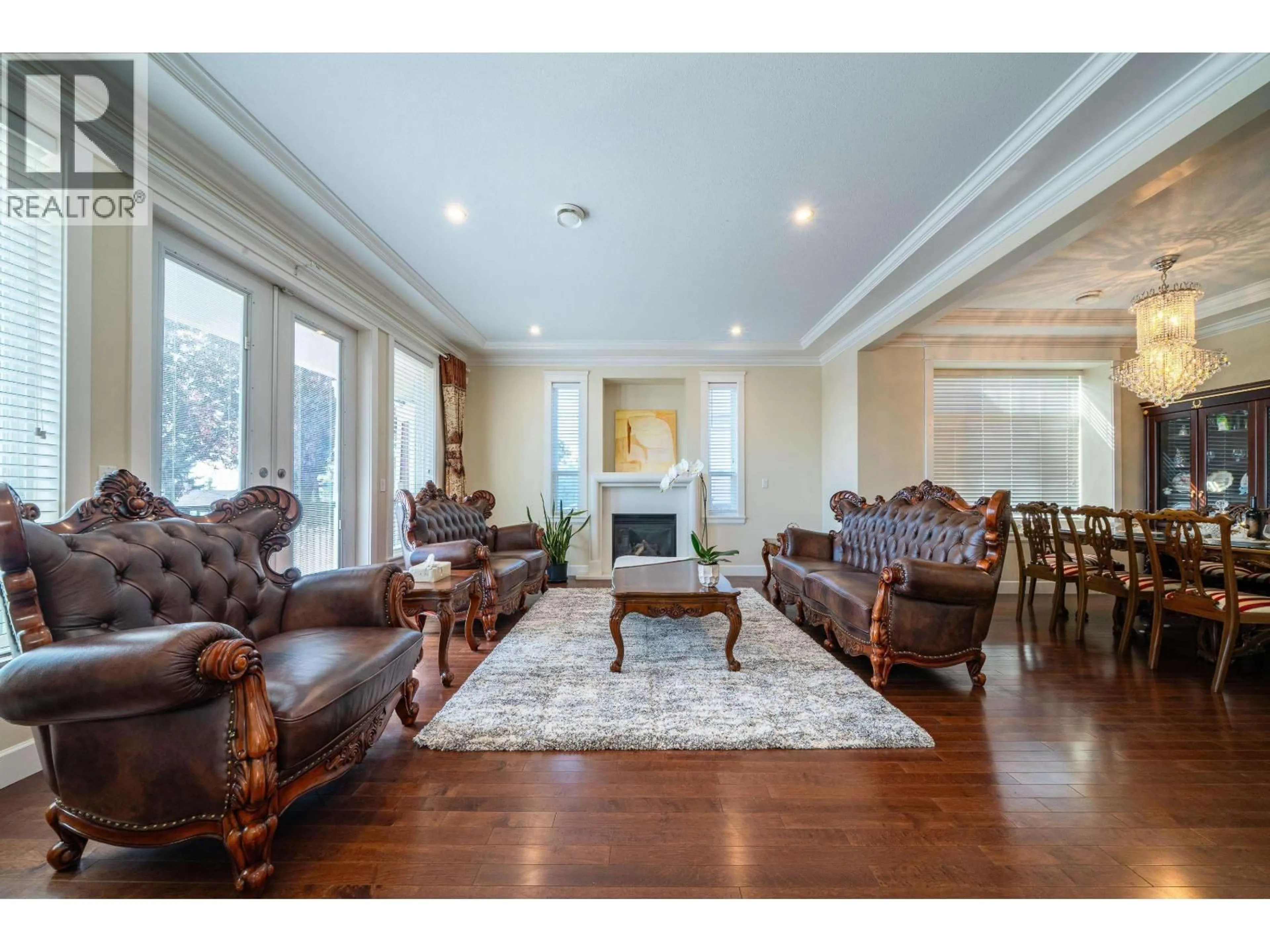 Living room with furniture, wood/laminate floor for 5511 MCKEE STREET, Burnaby British Columbia V5J2T9