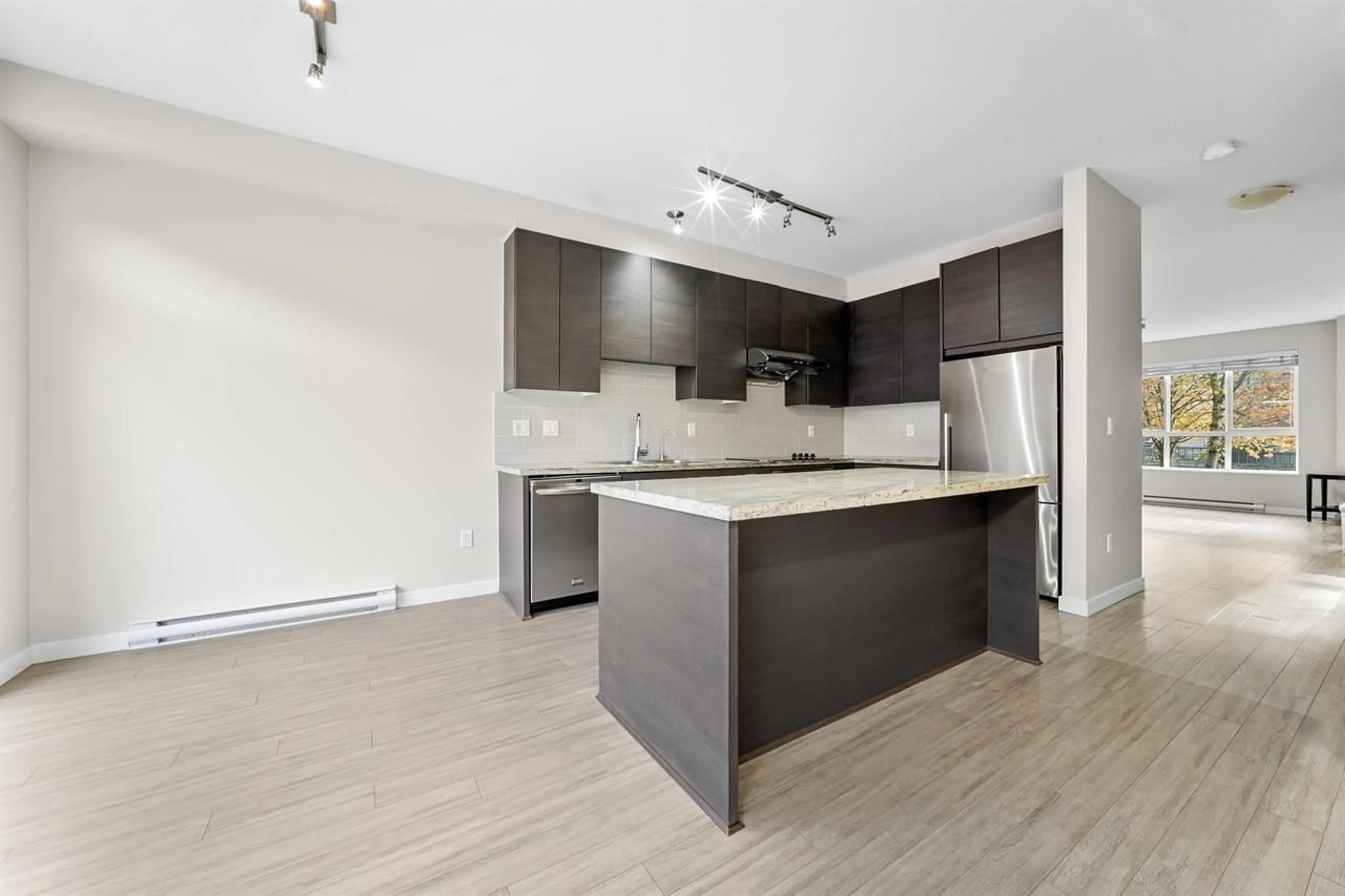 Open concept kitchen, wood/laminate floor for 67 - 10489 DELSOM CRESCENT, Delta British Columbia V4C0B9