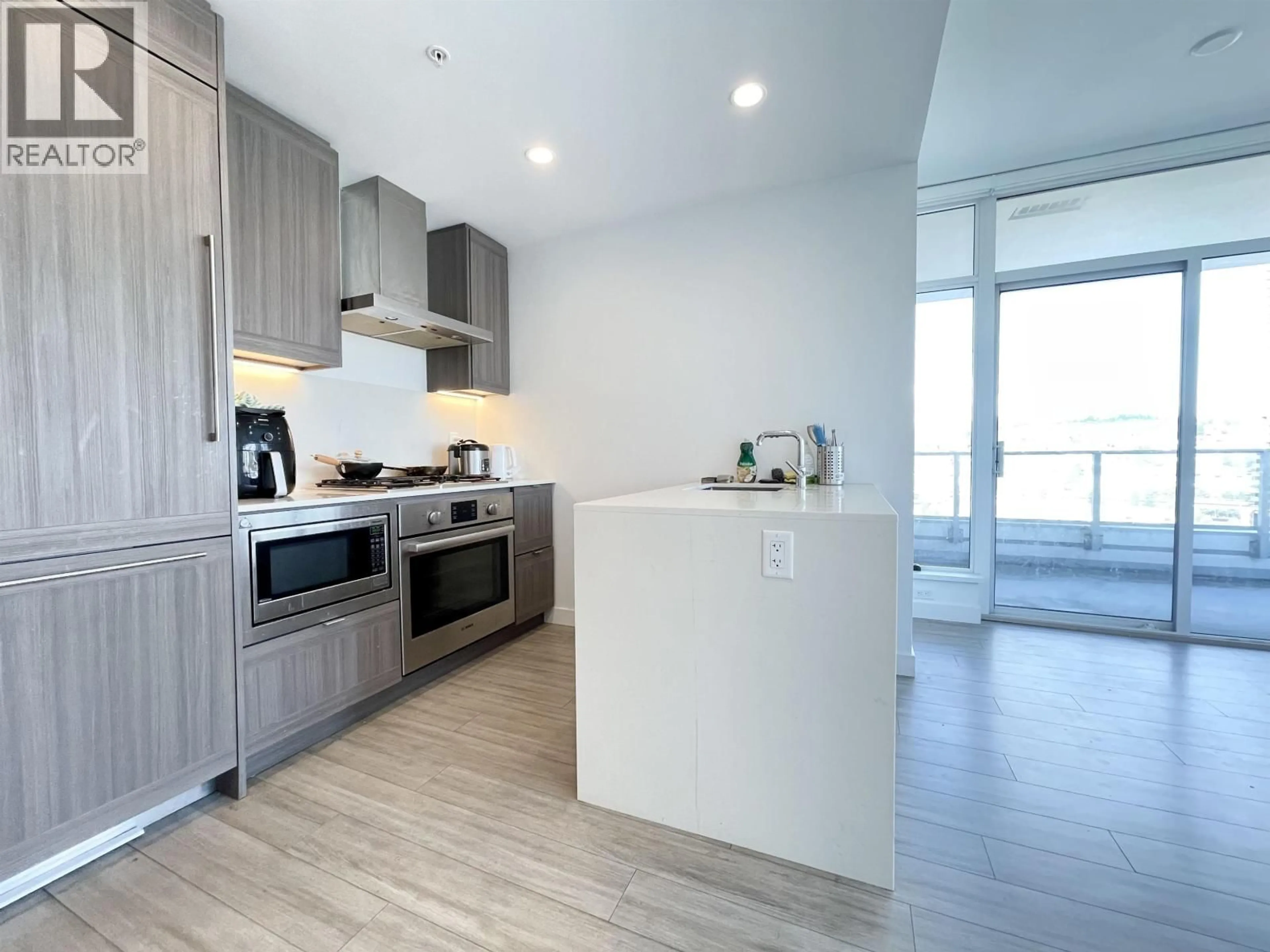 Open concept kitchen, unknown for 1604 - 2351 BETA AVENUE, Burnaby British Columbia V5C0M2
