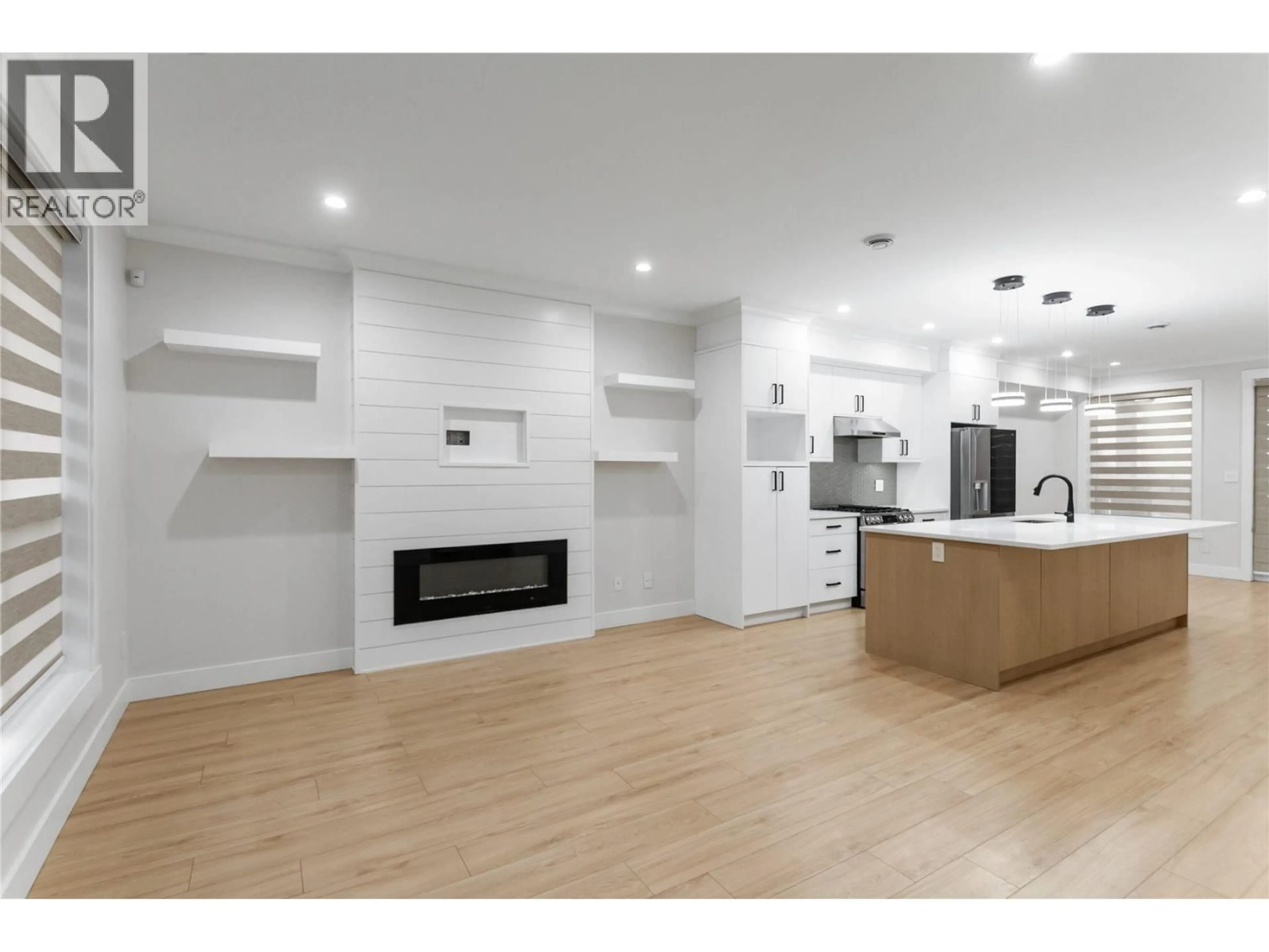 Open concept kitchen, wood/laminate floor for 102 - 954 EDGAR AVENUE, Coquitlam British Columbia V3K2J9