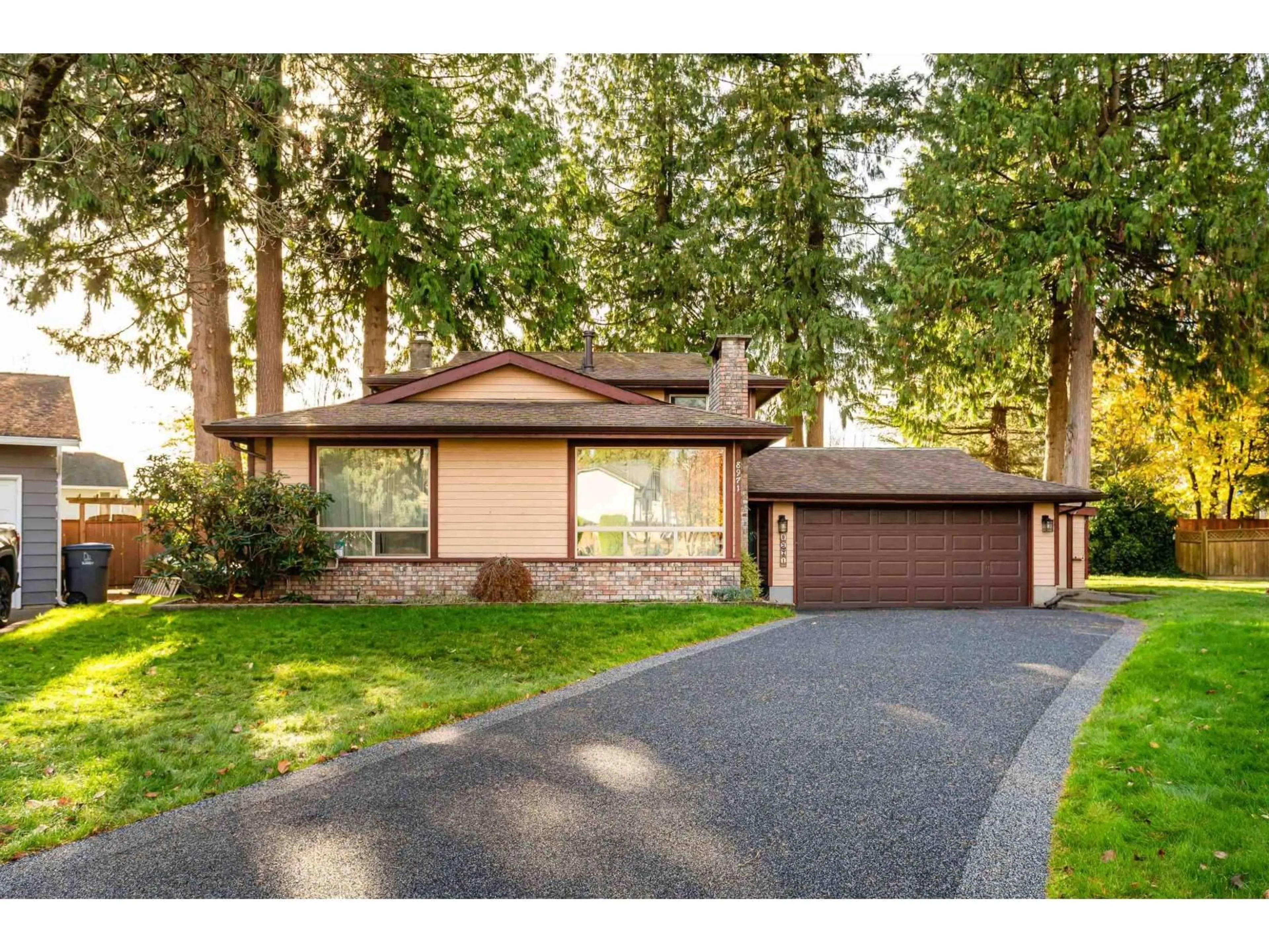 Home with vinyl exterior material, street for 8971 145A STREET, Surrey British Columbia V3R7J7