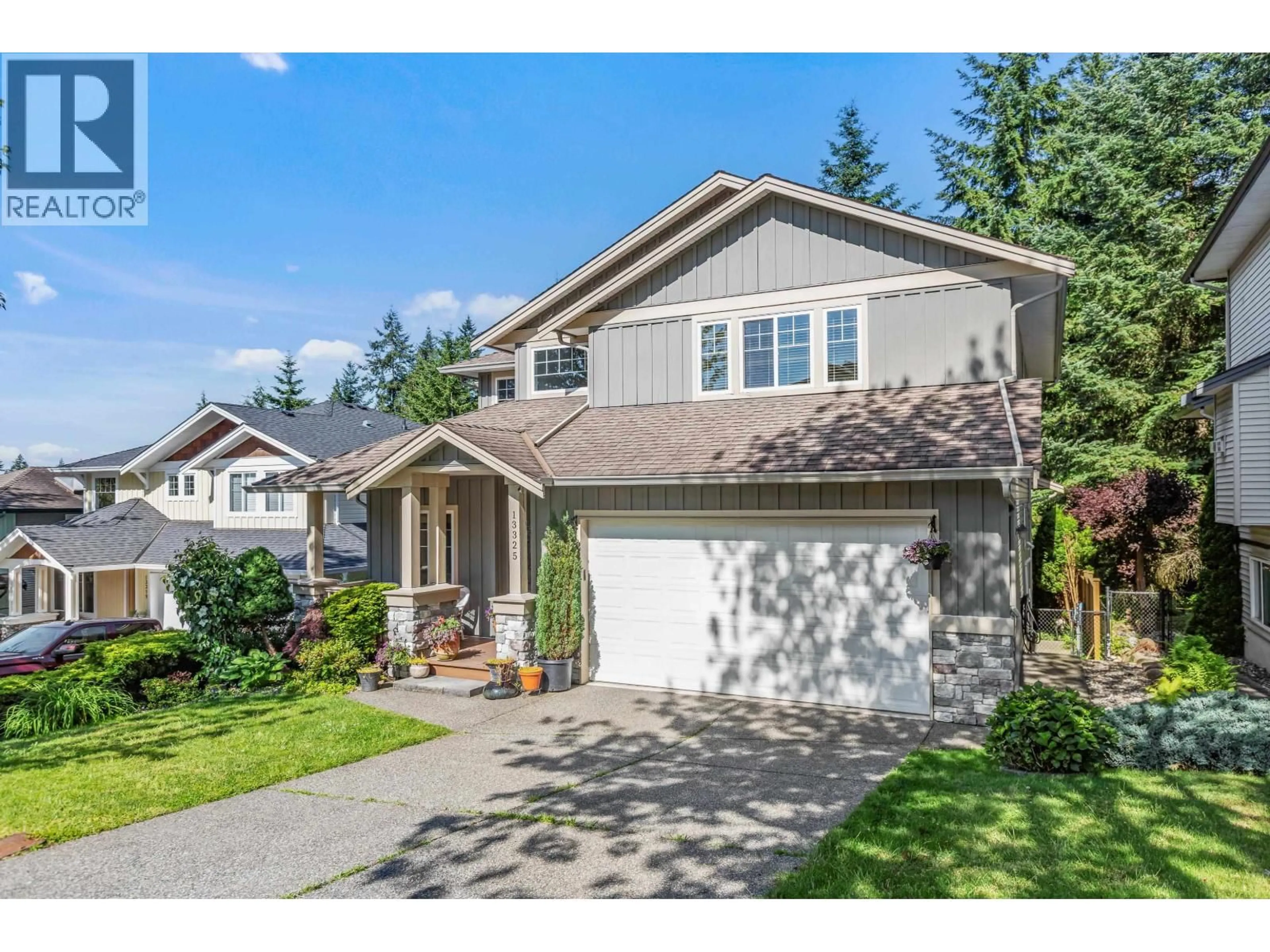 Home with vinyl exterior material, street for 13325 235 STREET, Maple Ridge British Columbia V4R2W3