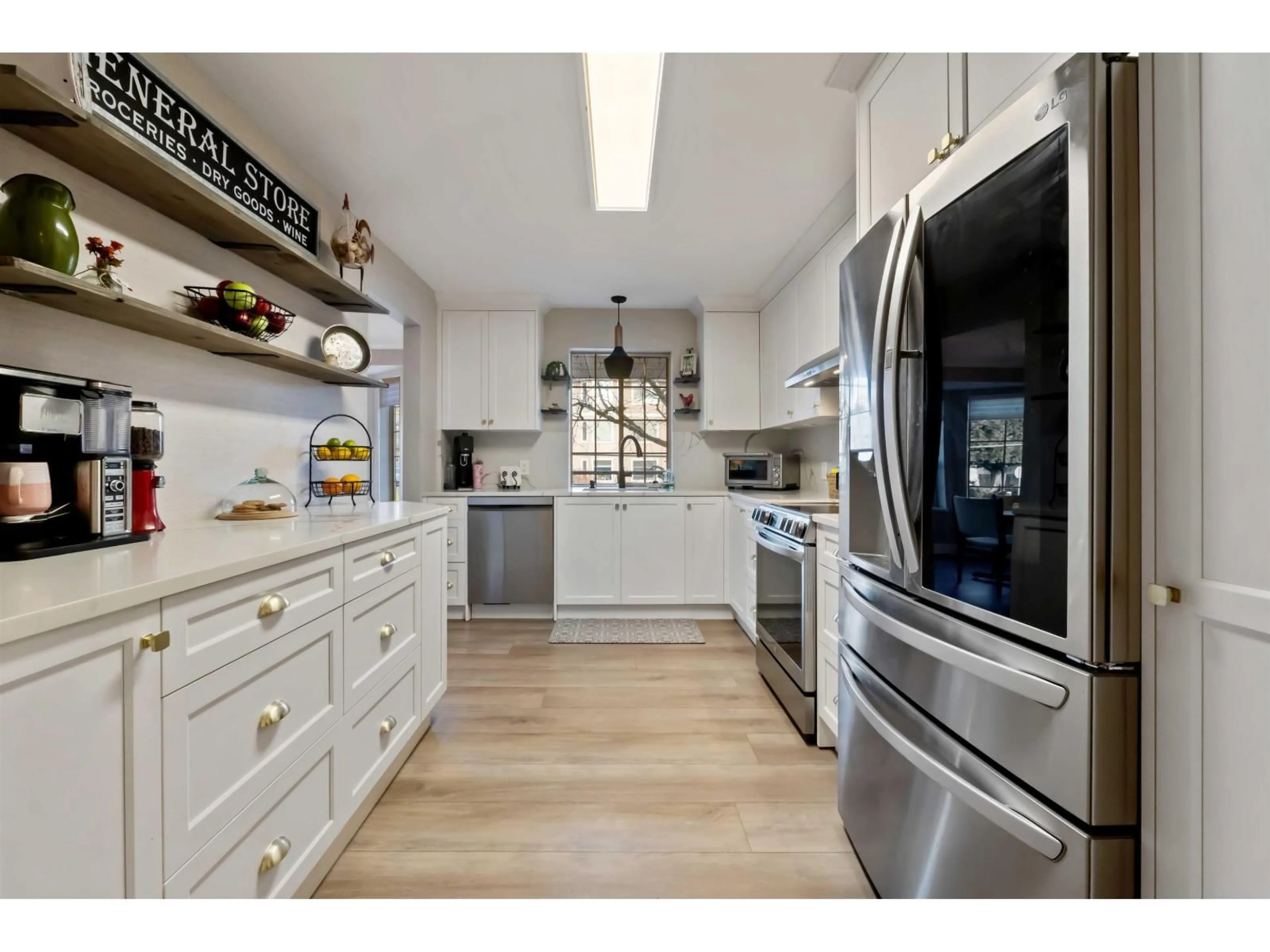 Open concept kitchen, unknown for 202 - 1488 MERKLIN STREET, White Rock British Columbia V4B4C3