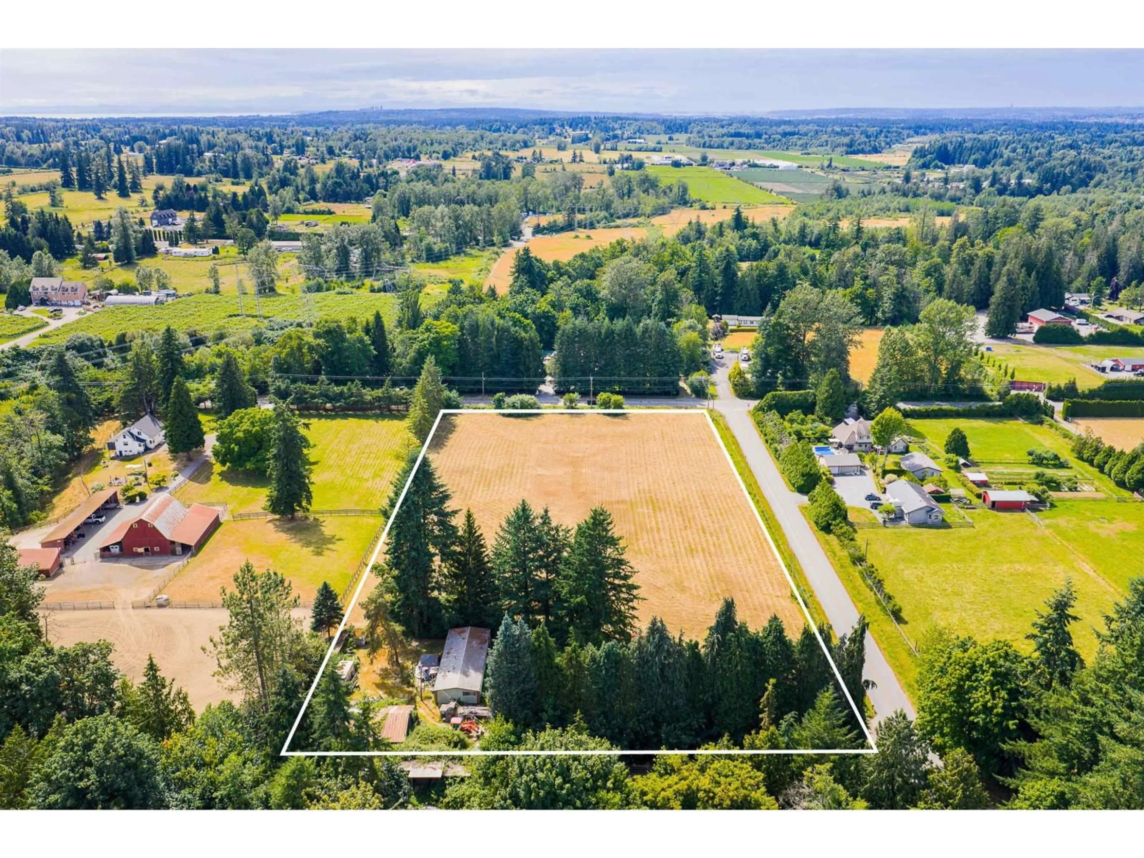 A pic from outside/outdoor area/front of a property/back of a property/a pic from drone, mountain view for 23296 32 AVENUE, Langley British Columbia V2Z2J1