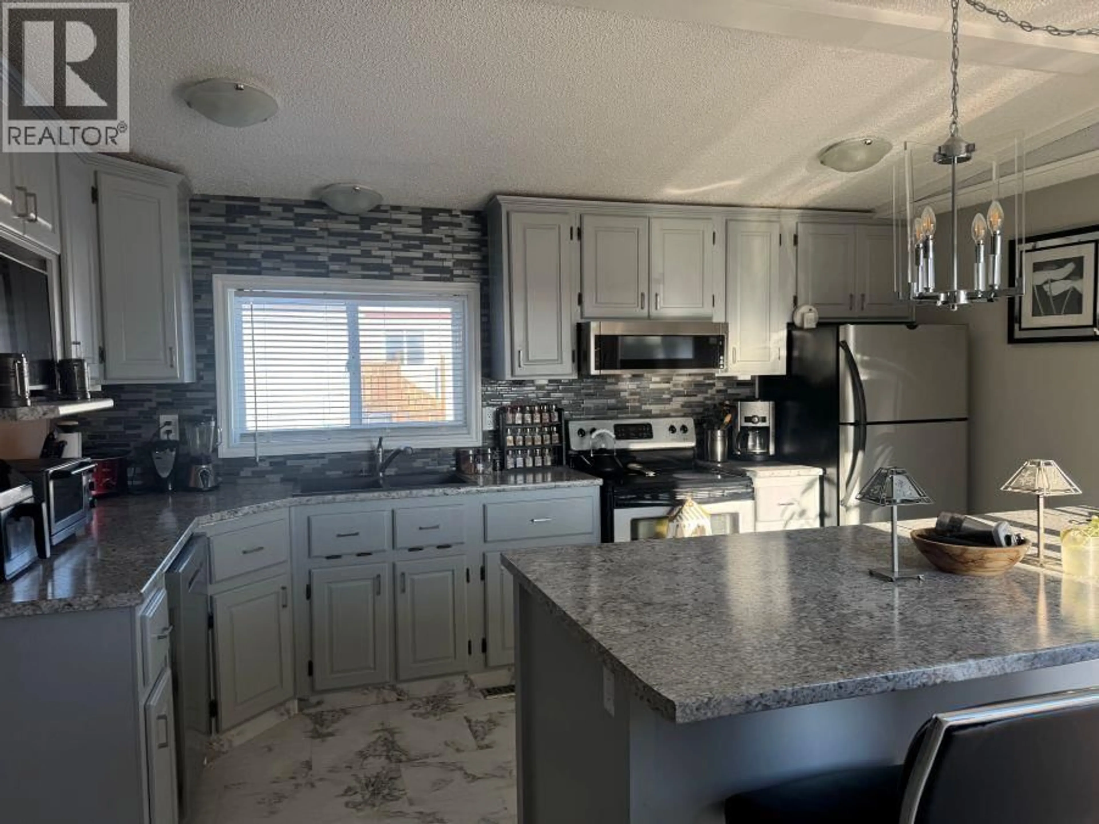 Open concept kitchen, ceramic/tile floor for 301 BLACKBURN ROAD, Prince George British Columbia V2N6G1
