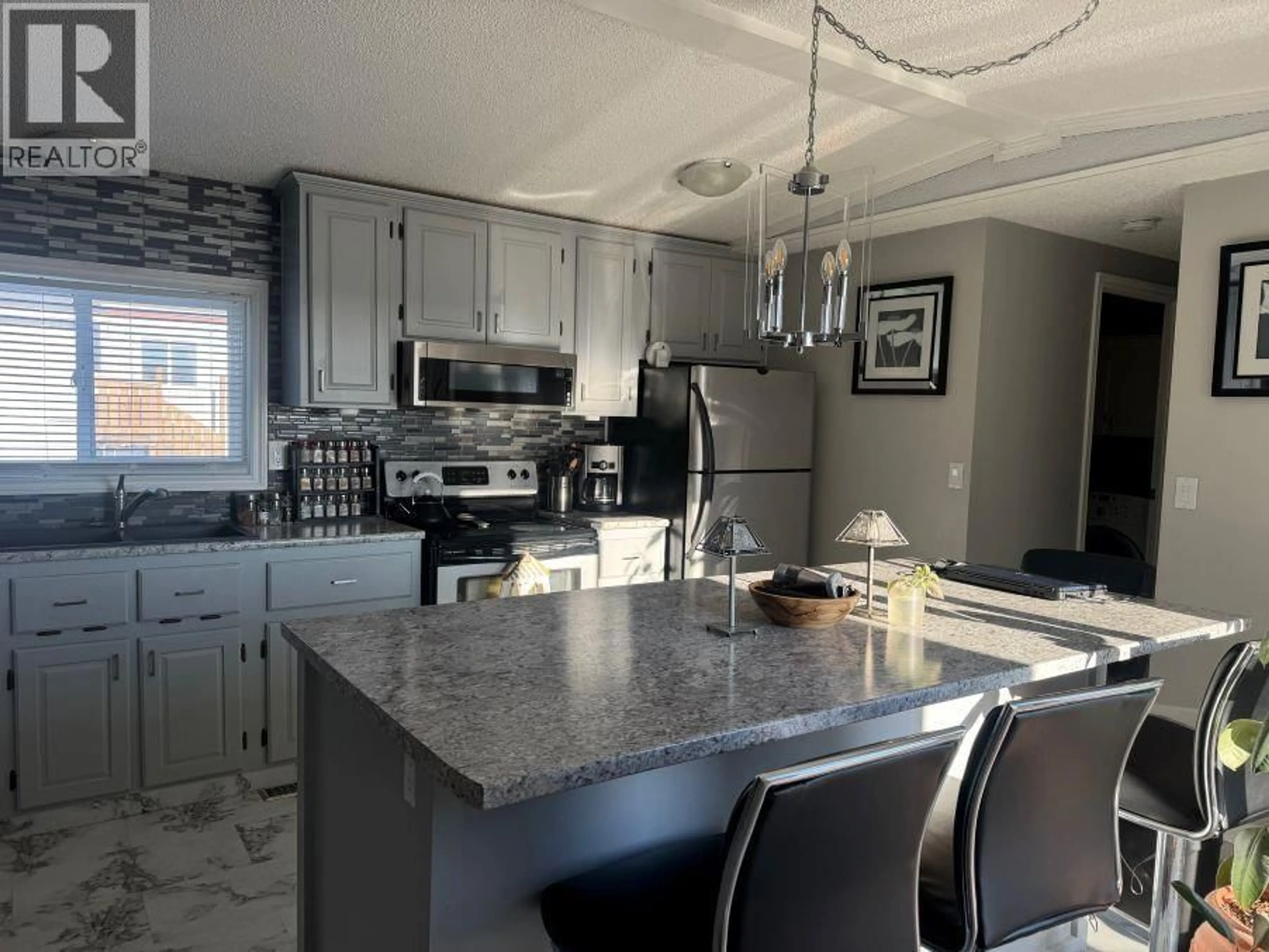Open concept kitchen, ceramic/tile floor for 301 BLACKBURN ROAD, Prince George British Columbia V2N6G1