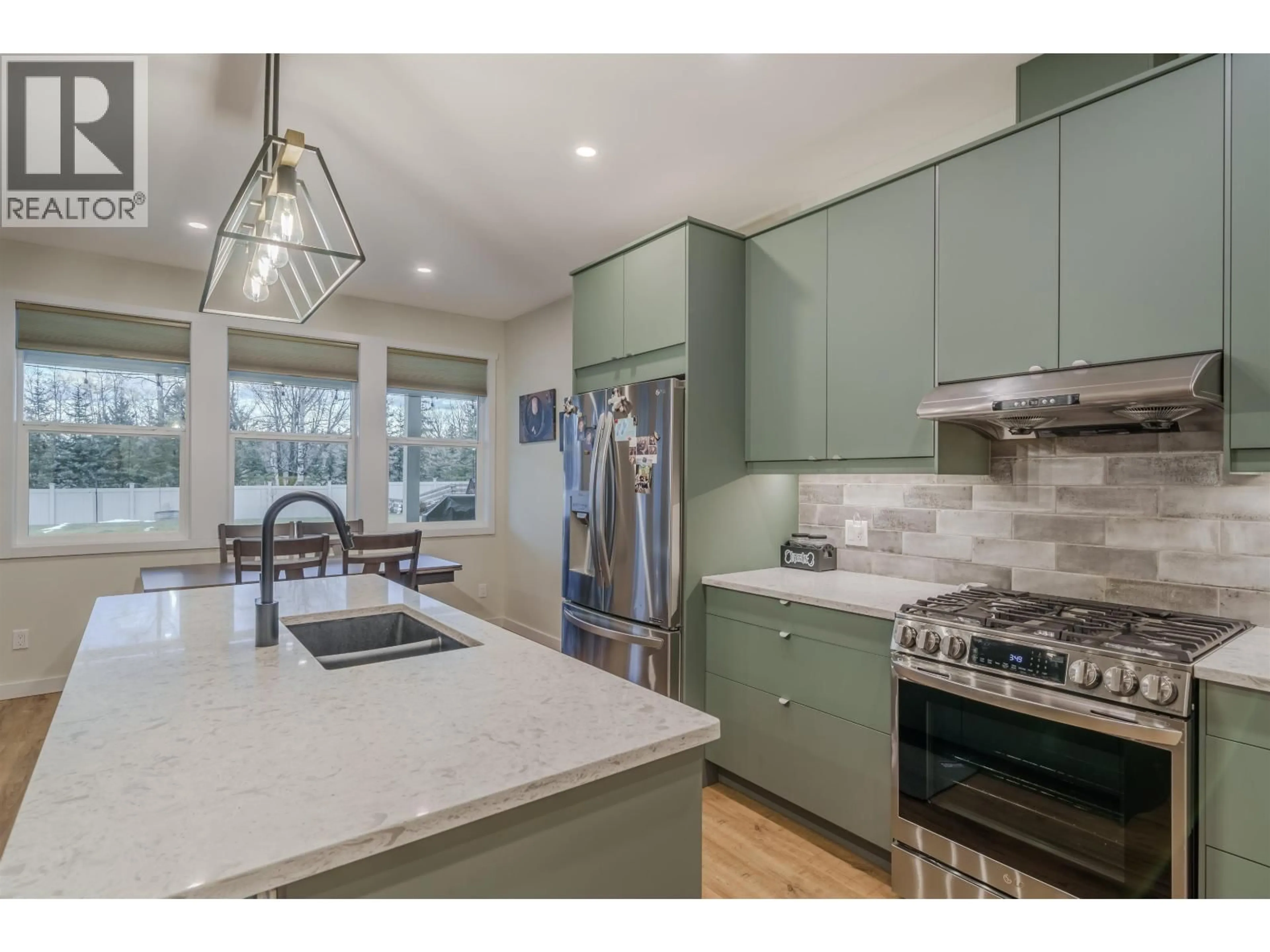 Open concept kitchen, unknown for 314 SANDHILL CRESCENT, 100 Mile House British Columbia V0K2E0