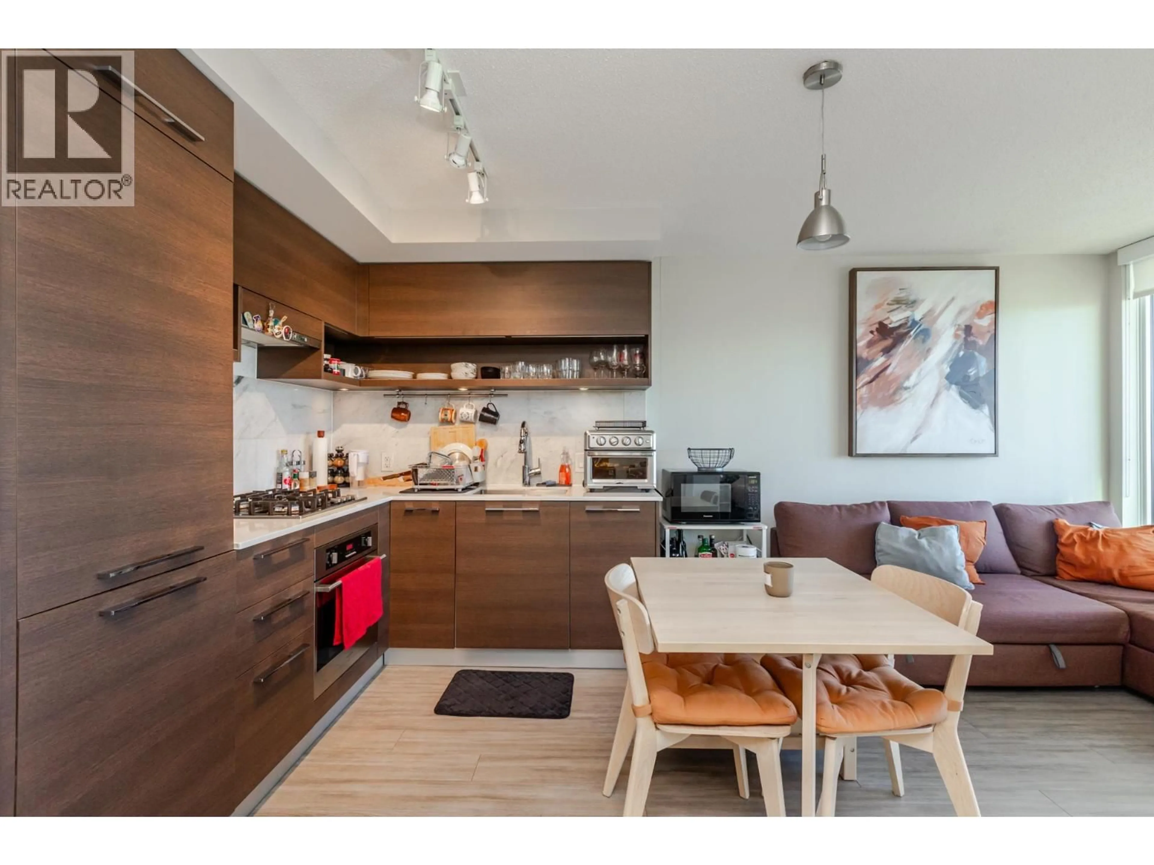 Open concept kitchen, wood/laminate floor for 2101 - 570 EMERSON STREET, Coquitlam British Columbia V3J0G3