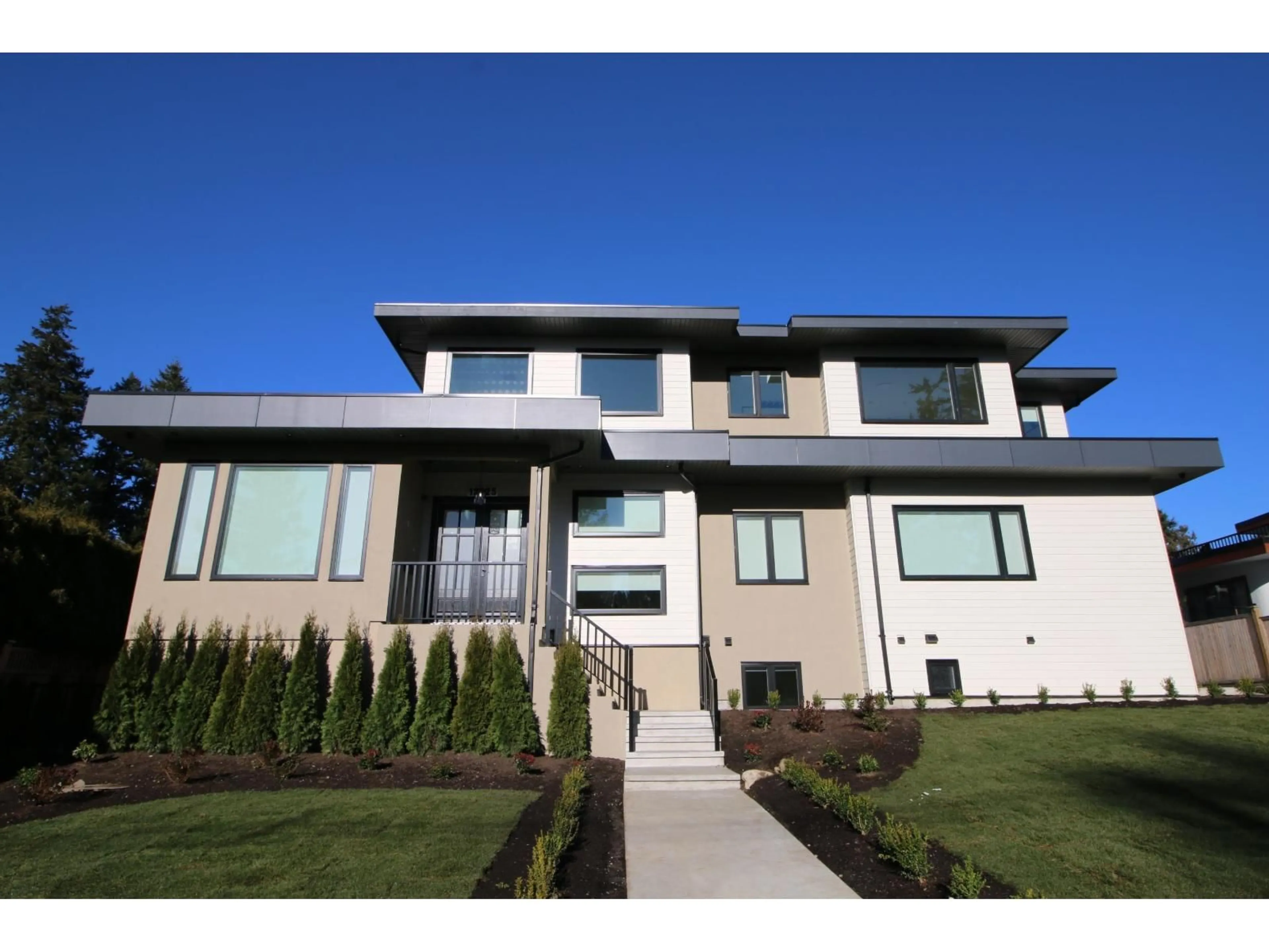 Home with vinyl exterior material, street for 13525 16TH AVENUE, Surrey British Columbia V4A9K9