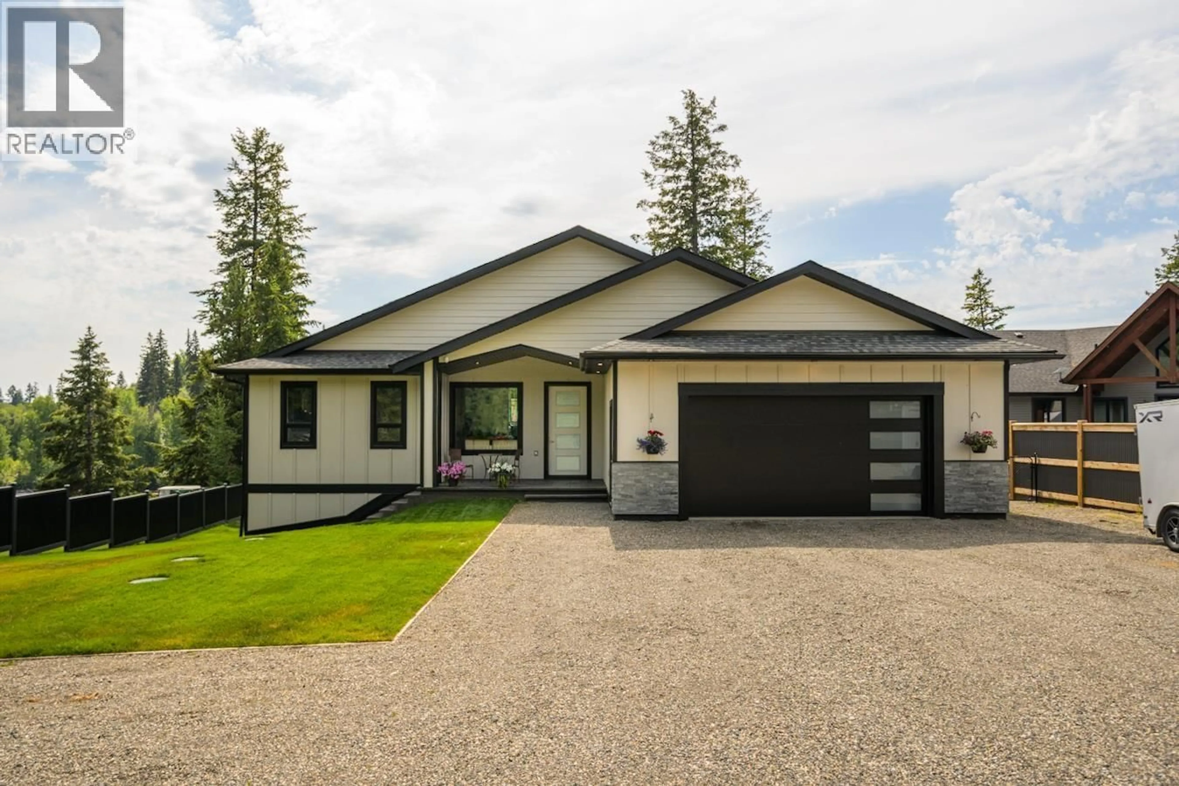 Home with vinyl exterior material, street for 27735 NESS LAKE ROAD, Prince George British Columbia V2K5N5