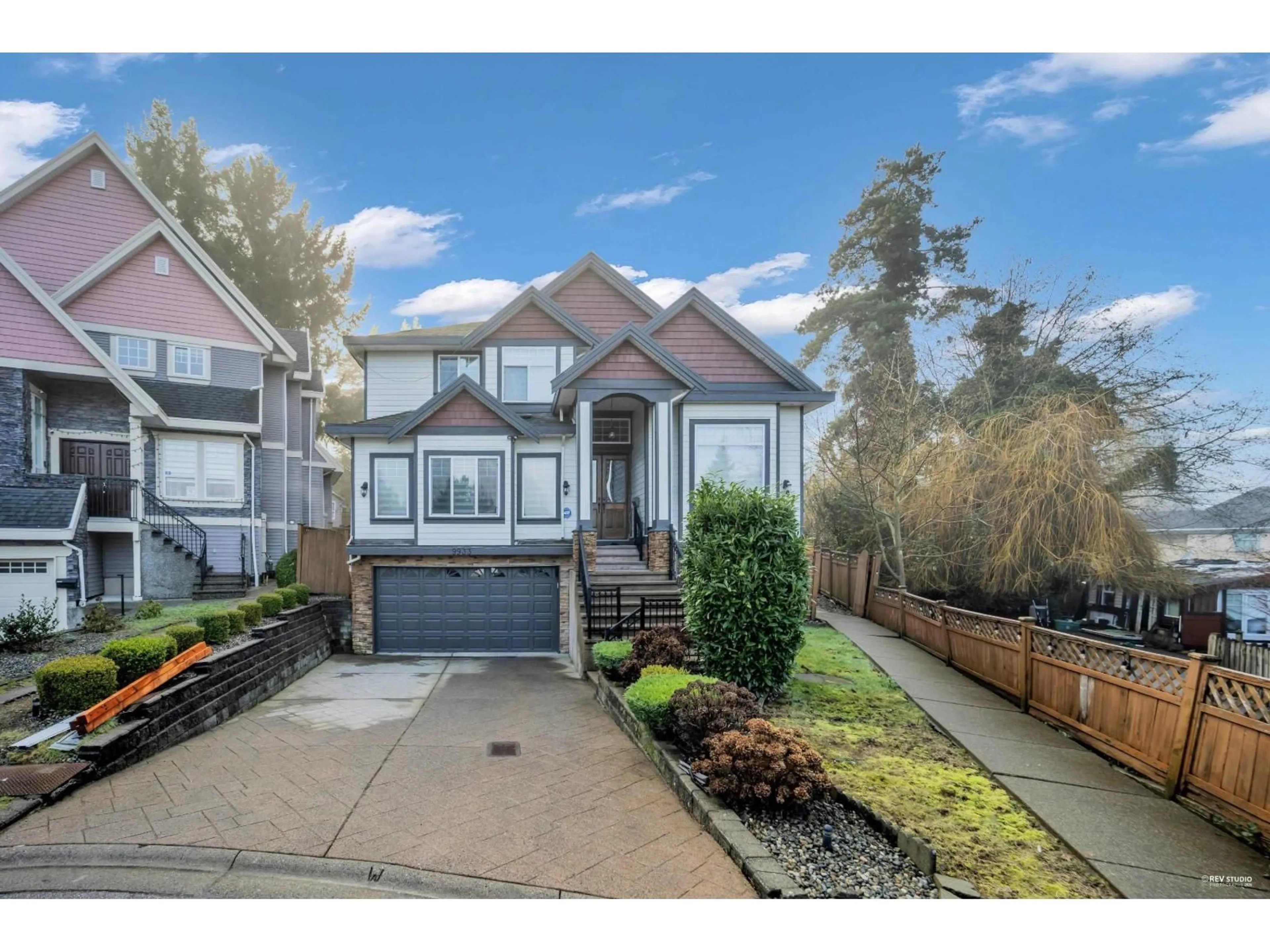 Home with vinyl exterior material, street for 9933 116A STREET, Surrey British Columbia V3V7K5