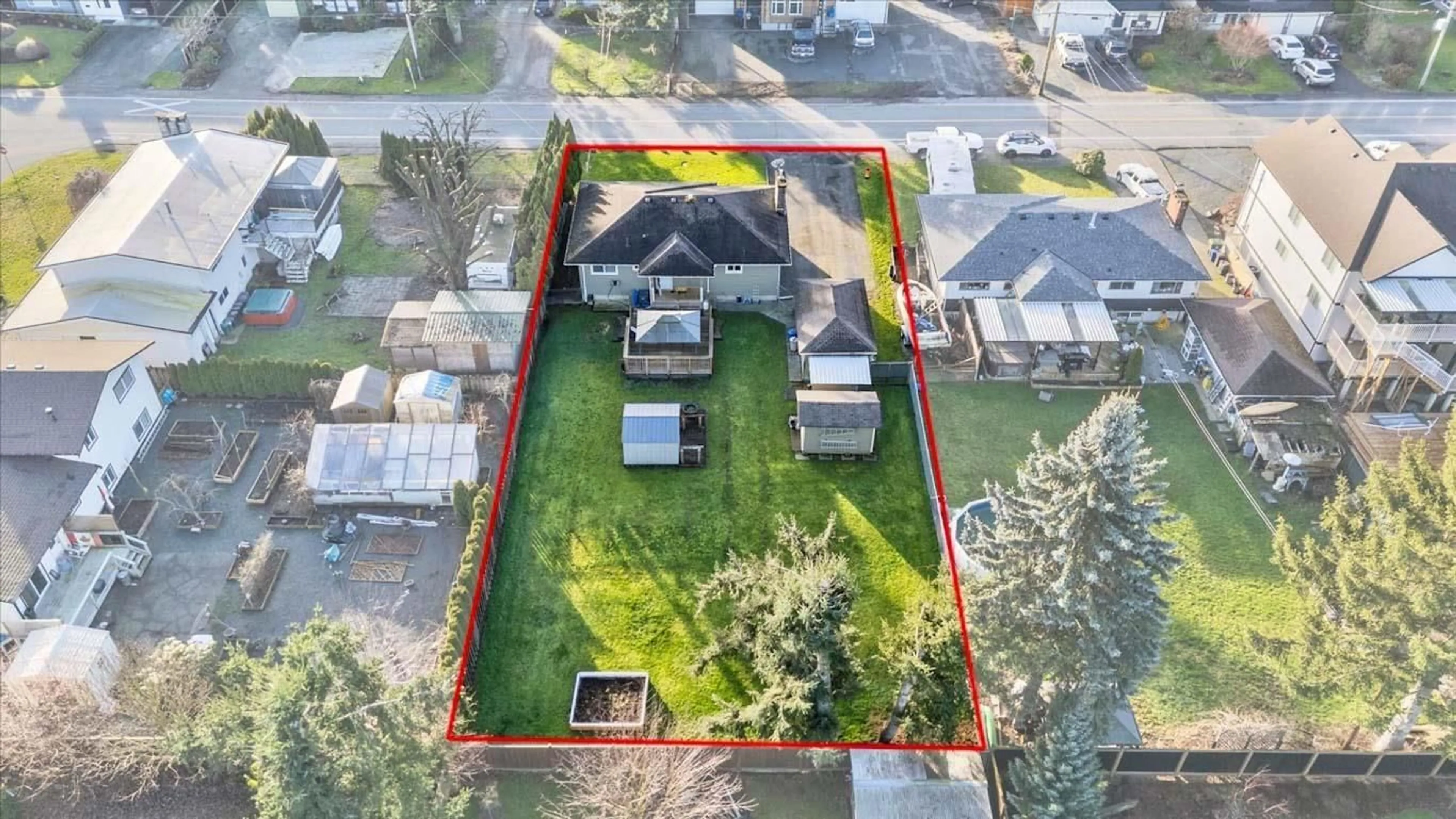 A pic from outside/outdoor area/front of a property/back of a property/a pic from drone, street for 46329 STRATHCONA ROAD, Chilliwack British Columbia V2P3T1