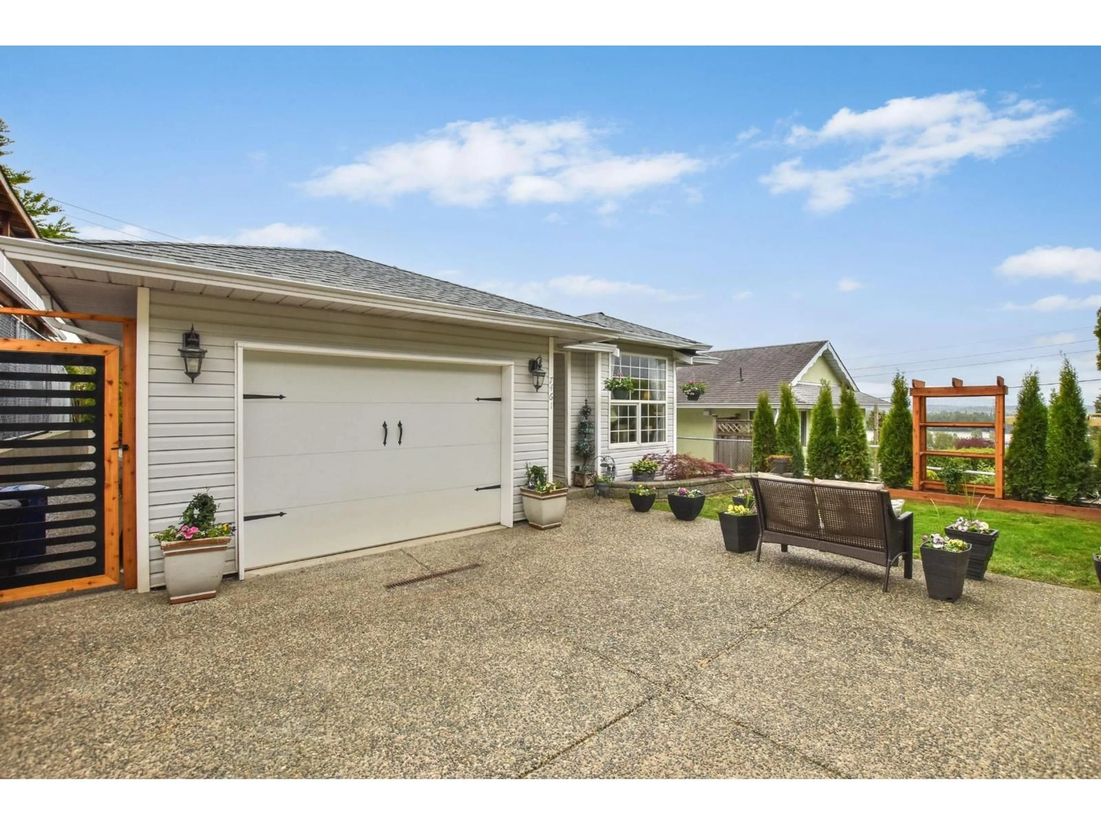 Home with vinyl exterior material, street for 7461 MURRAY STREET, Mission British Columbia V2V4A8