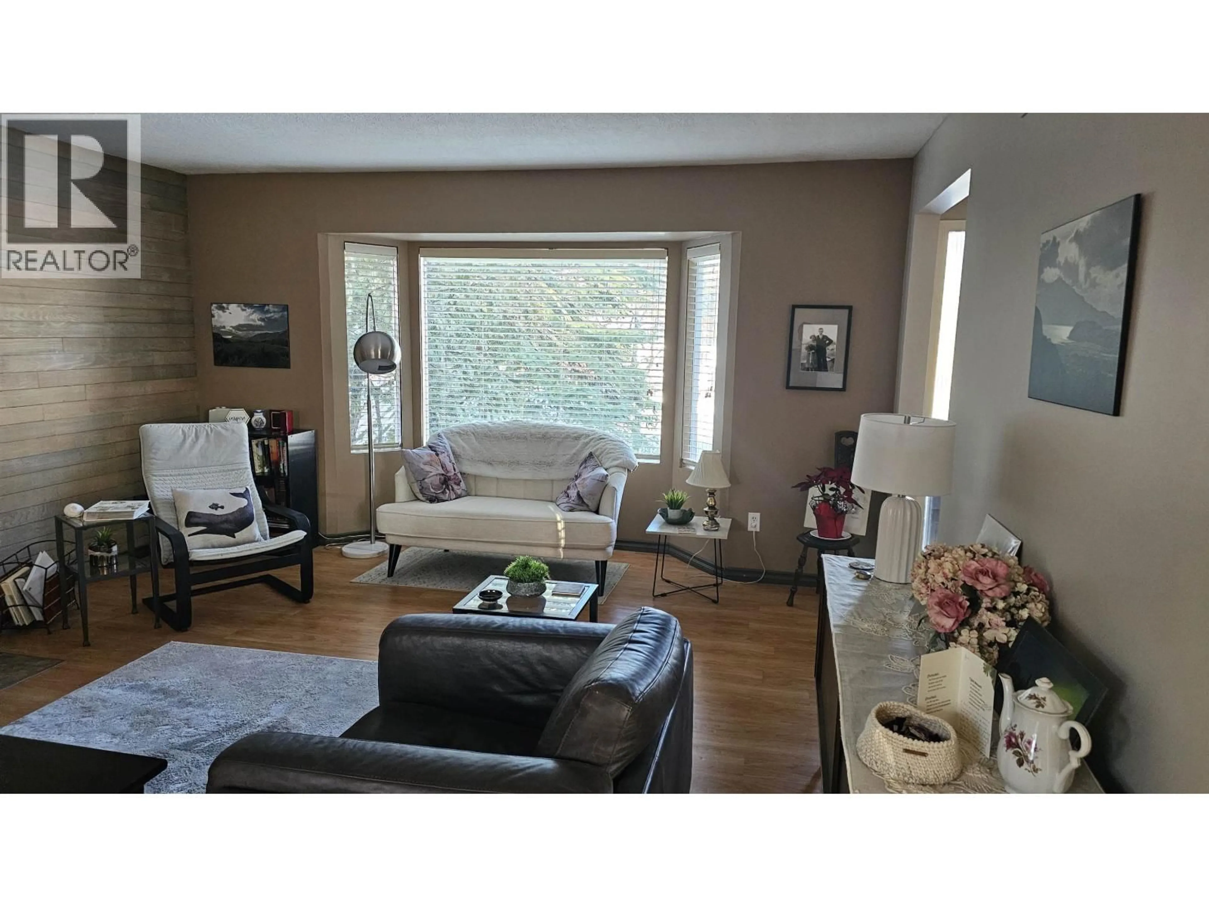Living room with furniture, wood/laminate floor for 5225 YORK PLACE, Prince George British Columbia V2N2A4